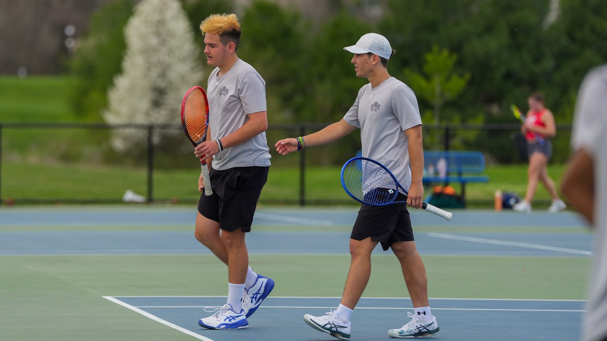 Wagner and Roy Walking On the Court