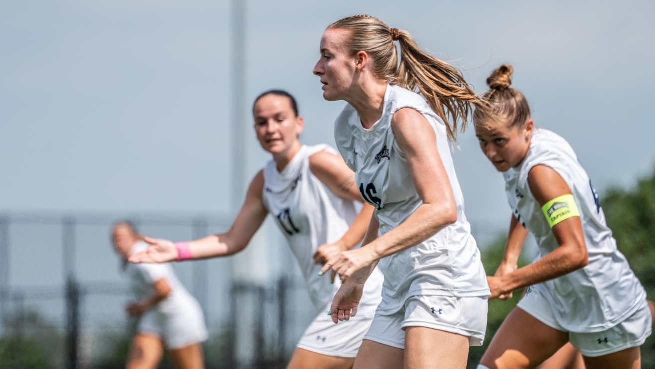 Cassidy Nichols Dribbling Upfield with Finn Cregan and Erin Antone Alongside