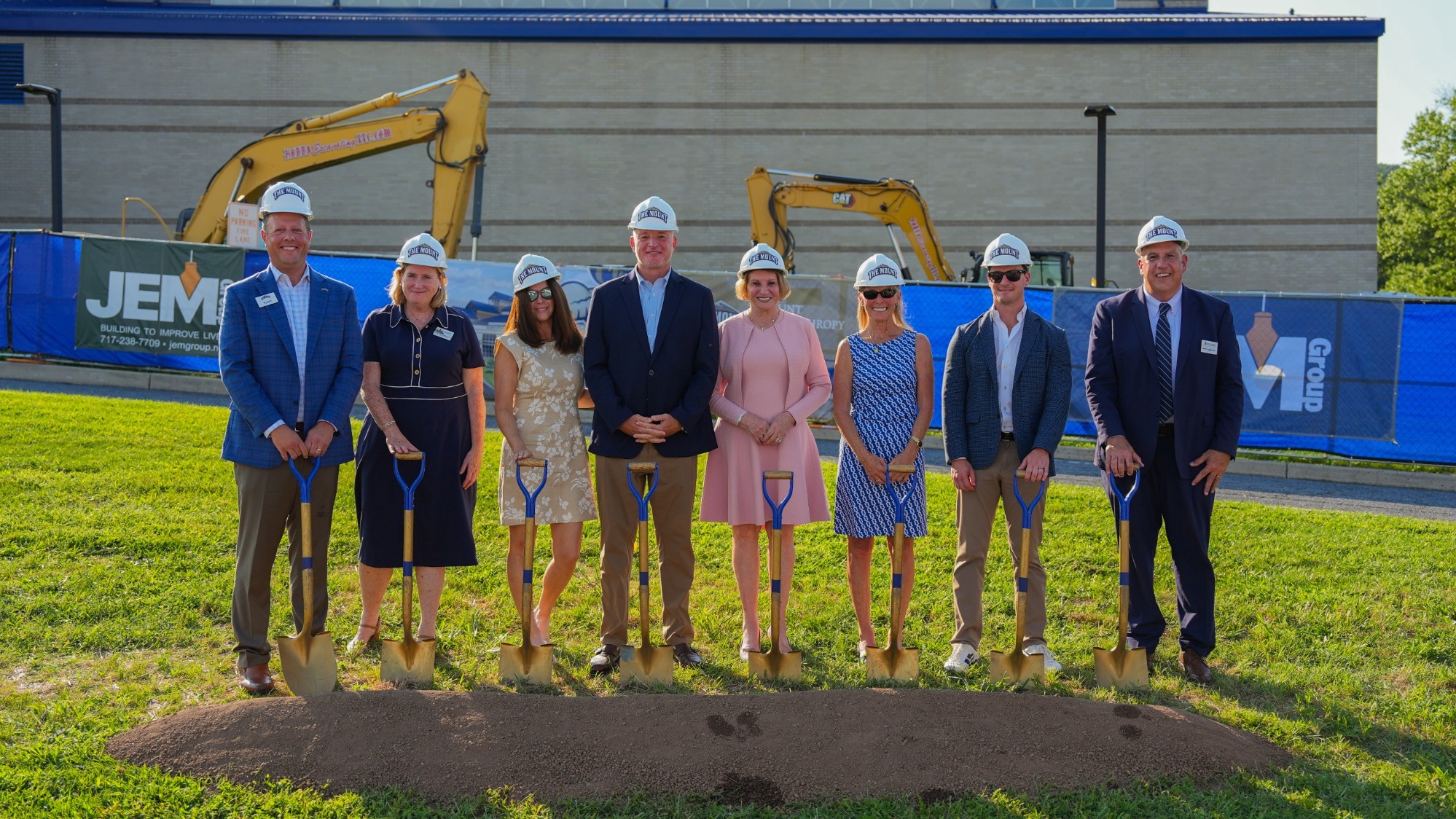 Members of the Rooney Family Pose with President Joyce, Athletic Director Brad Davis, and University VP Patty Hill-Callahan
