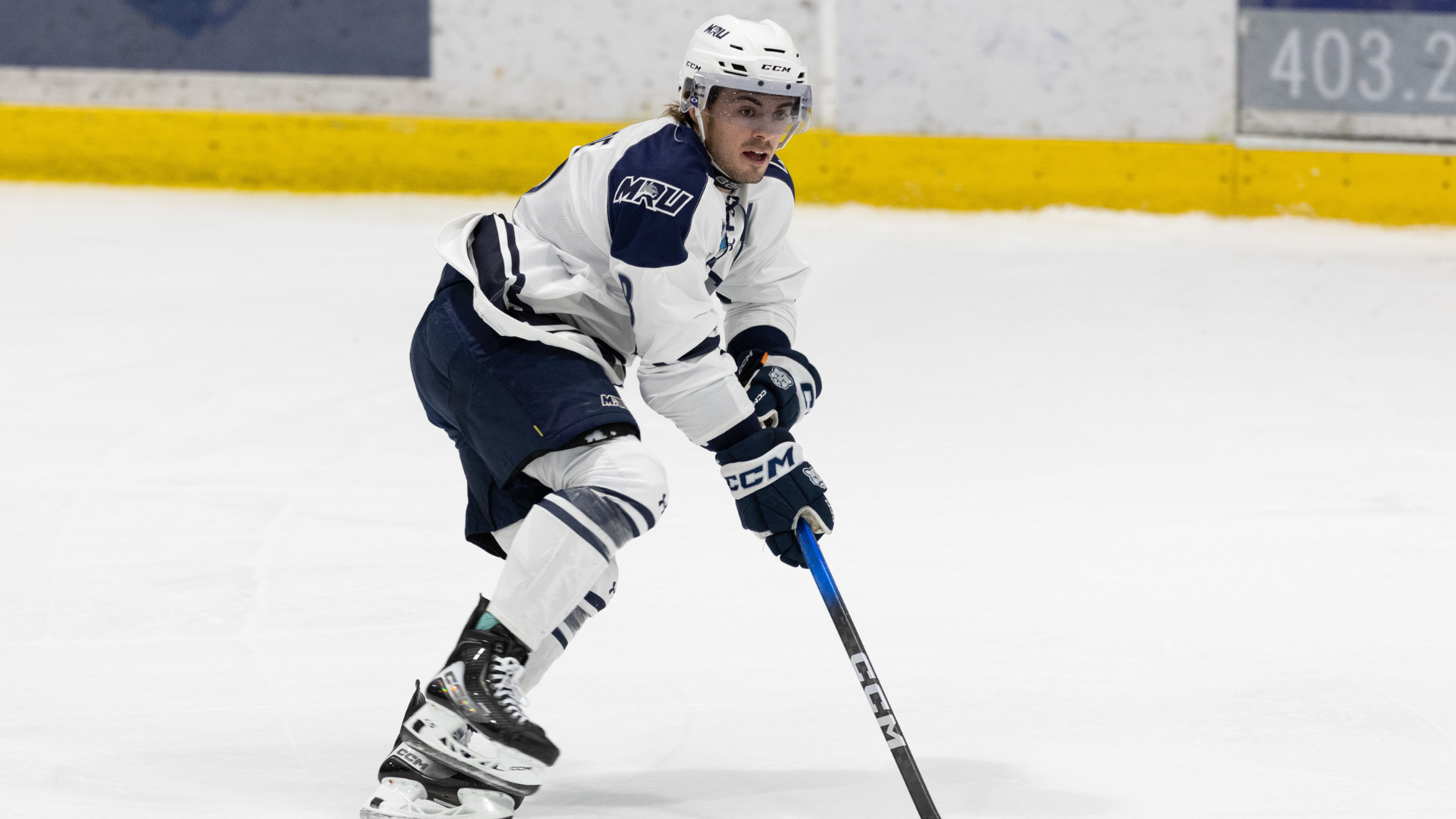 Cougars Forward Spencer Moe Heads Up Ice