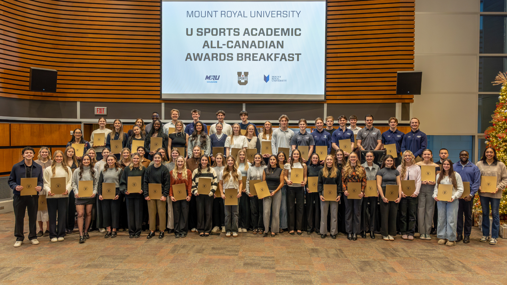 85 Cougars Athletes photographed together with their U SPORTS Academic All Canadian Awards