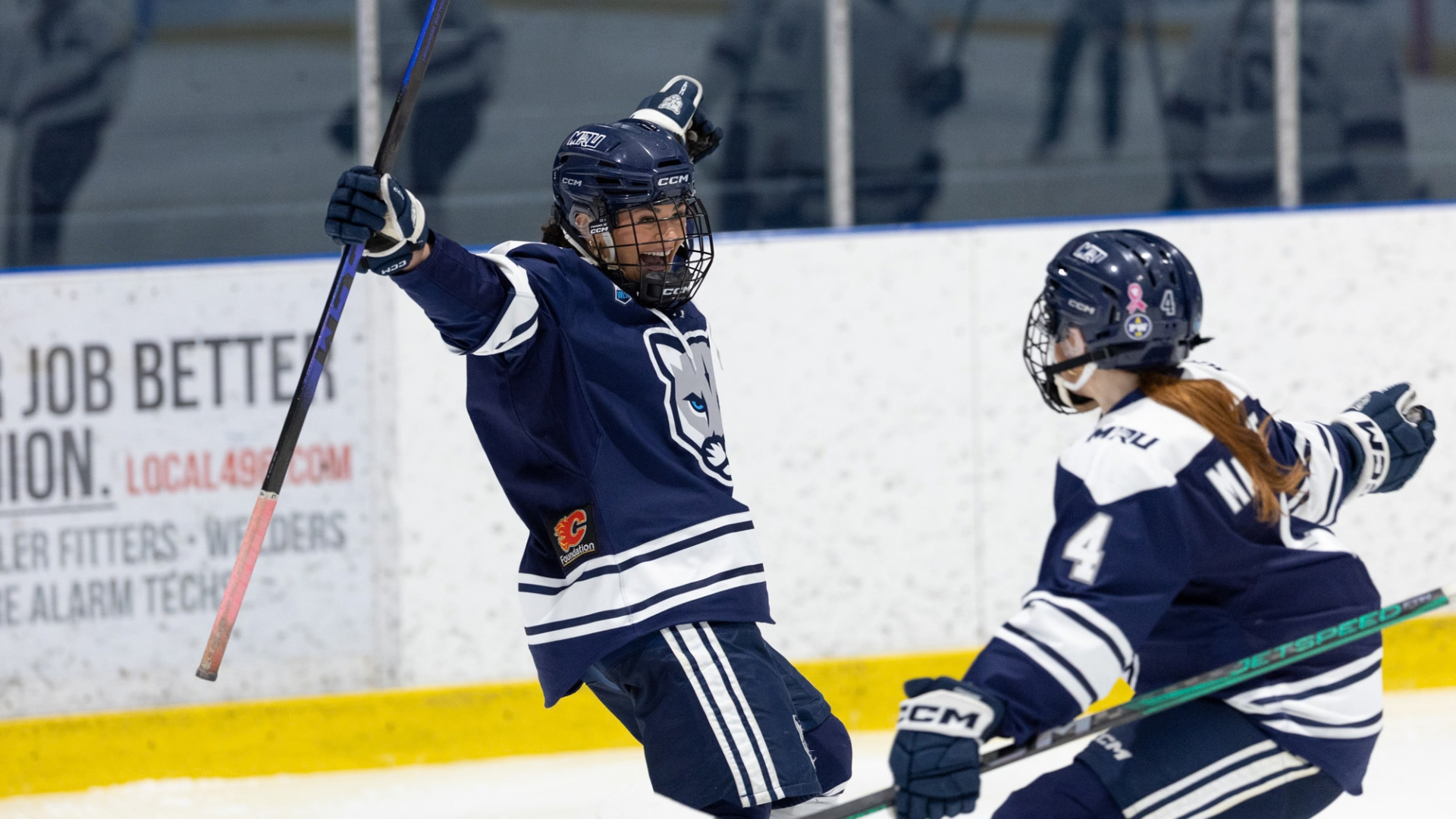 Bert celebrates eventual game wining goal with MacPhee.