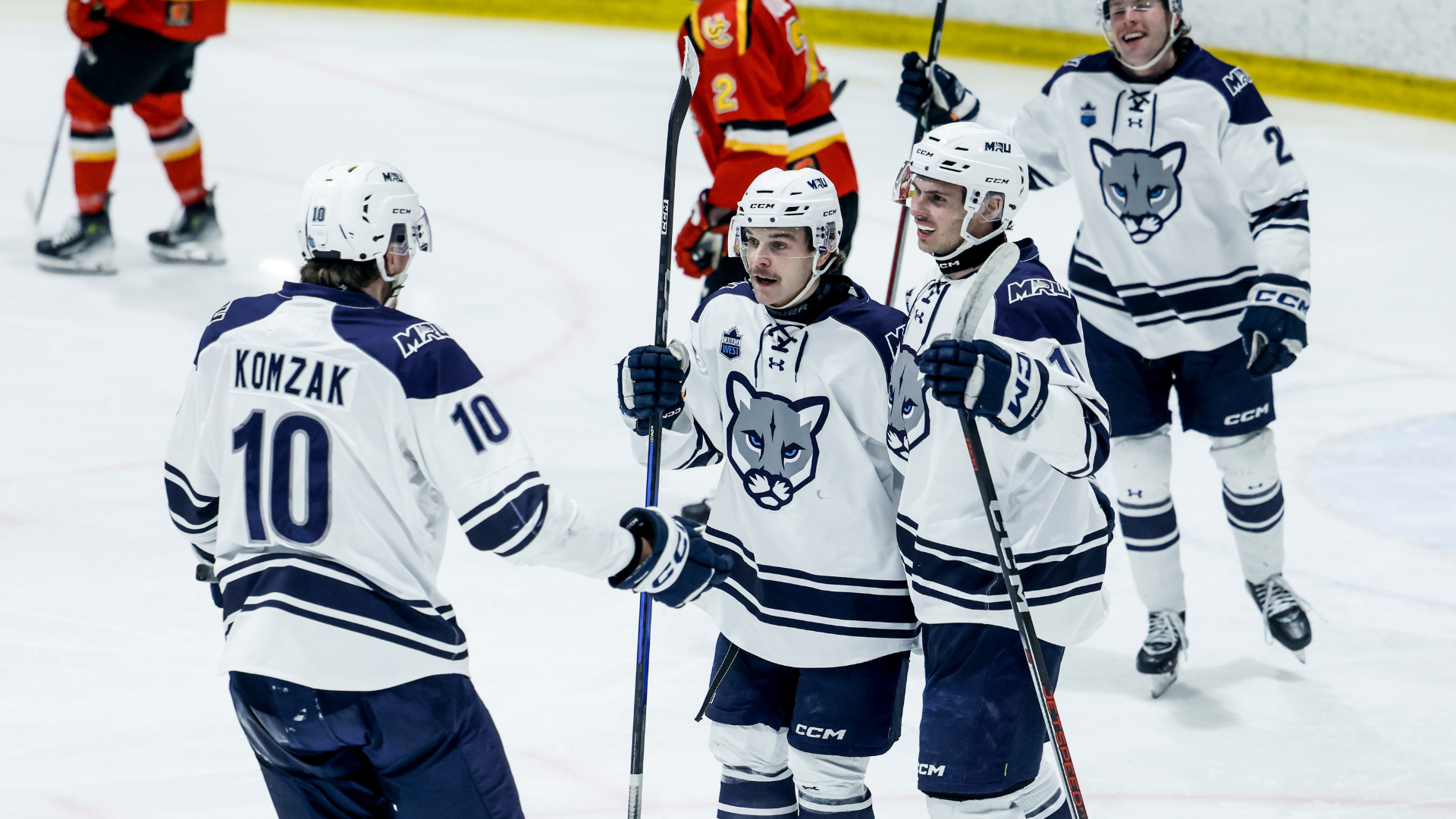 Wiens, Komzak, Milliken