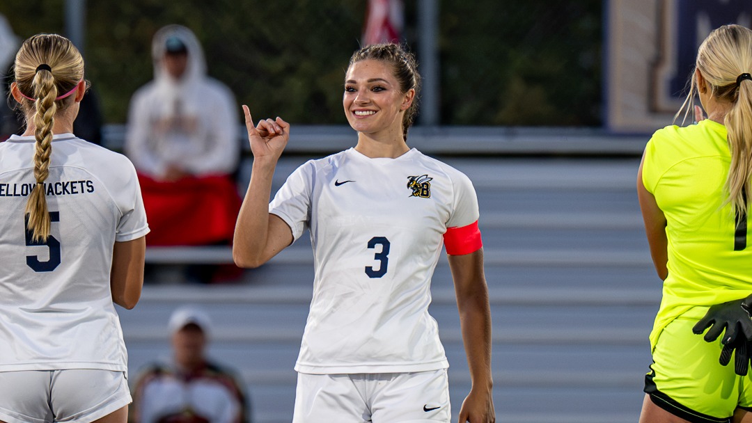 Ava Curtright does a stingers up celebration