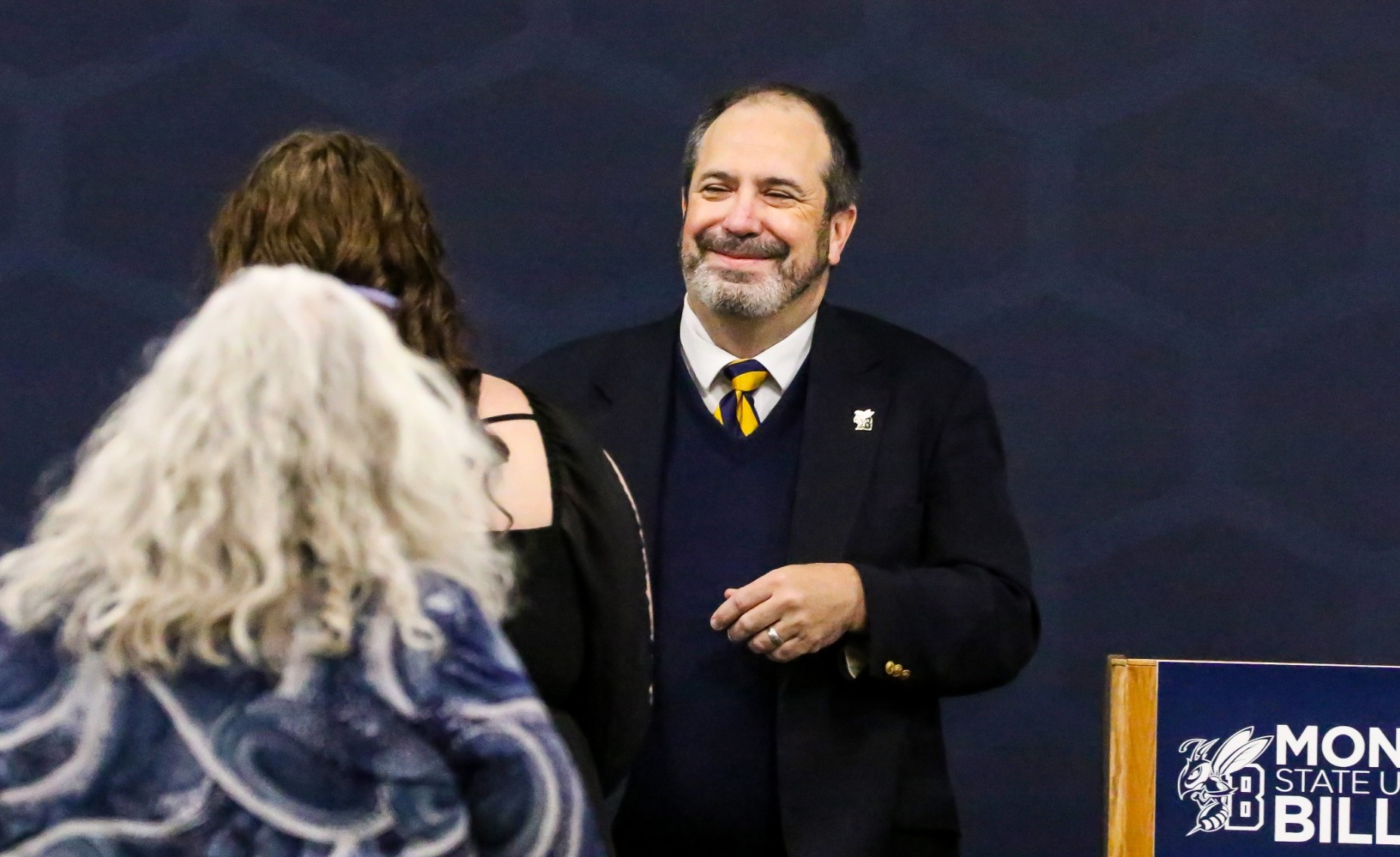 Tom Rust speaks to the crowd at MSUB's annual Chi Alpha Sigma ceremony