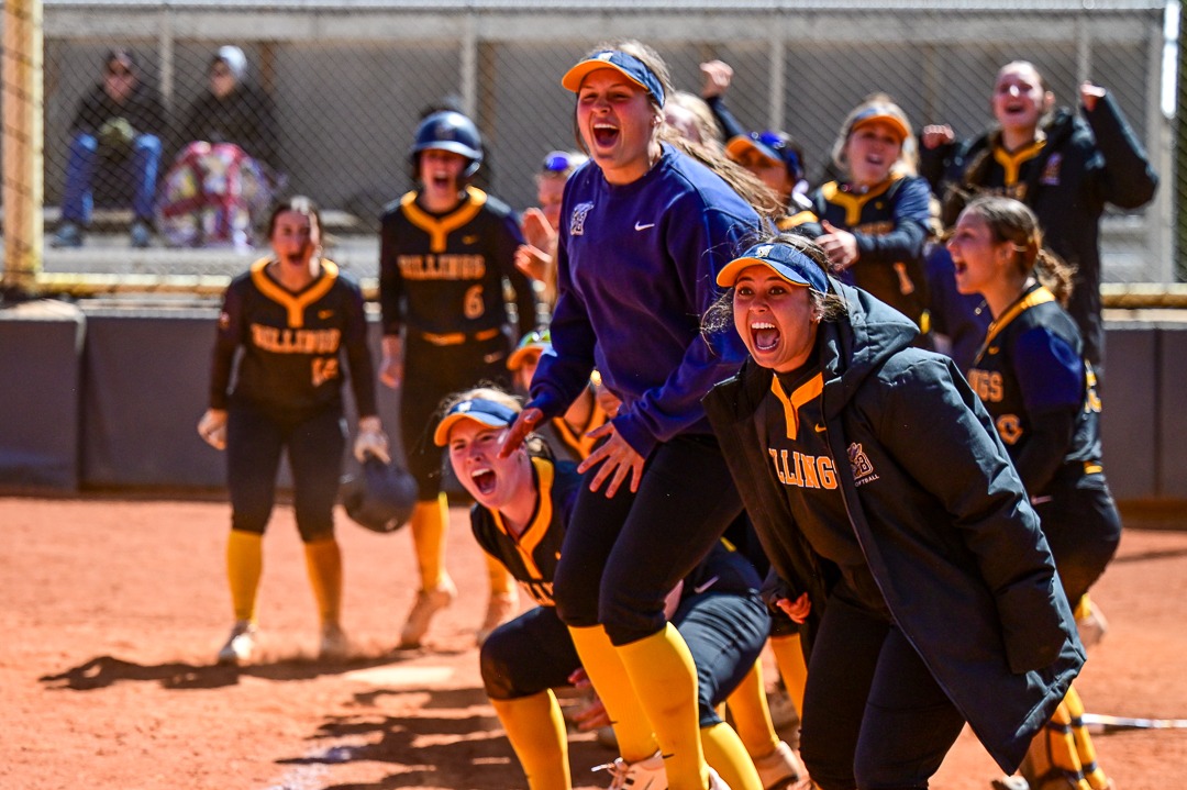 The Yellowjacket softball team celebrates at home plate following it's walk-off home run against Northwest Nazarene.