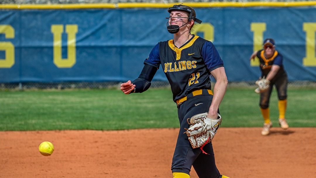 Danica Butler hurls a pitch over the plate for the Yellowjackets