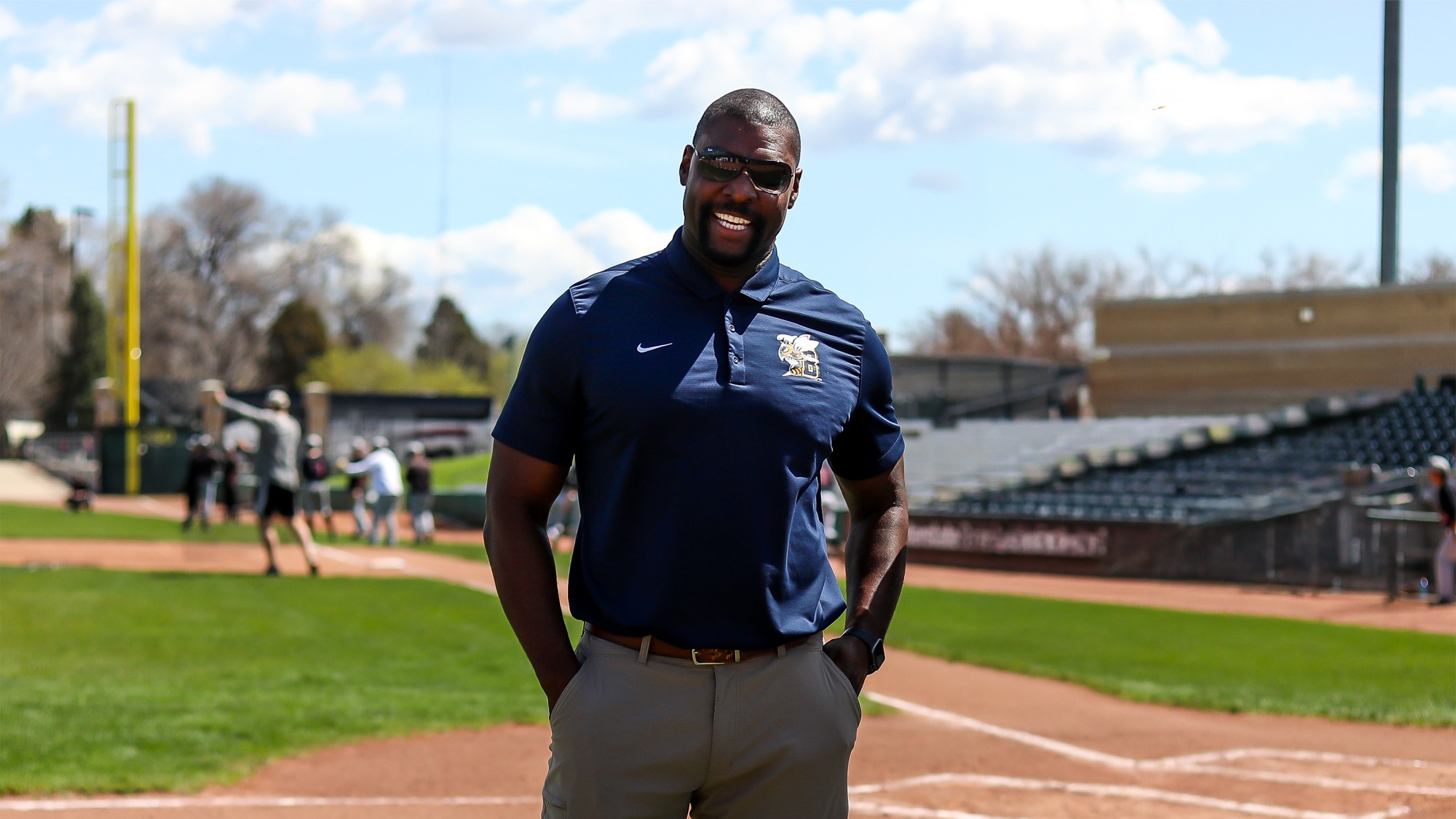 MSUB Athletic Director Mike Bazemore on the field pregame at Dehler Park with MSUB Baseball