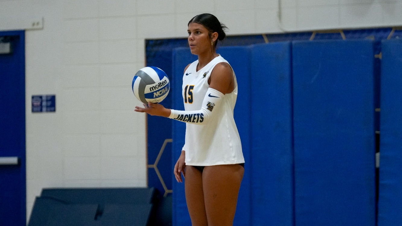 Mikayla Champlin prepares to serve the ball