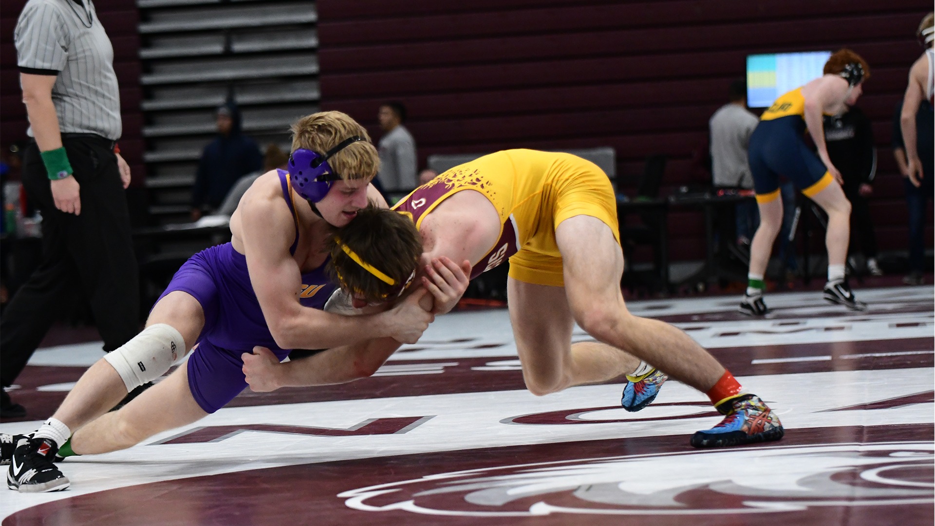 Chase Beckett works to secure a takedown at the Auggie Open.