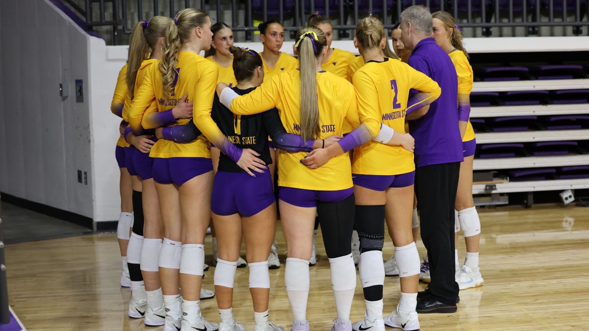 Volleyball team huddle