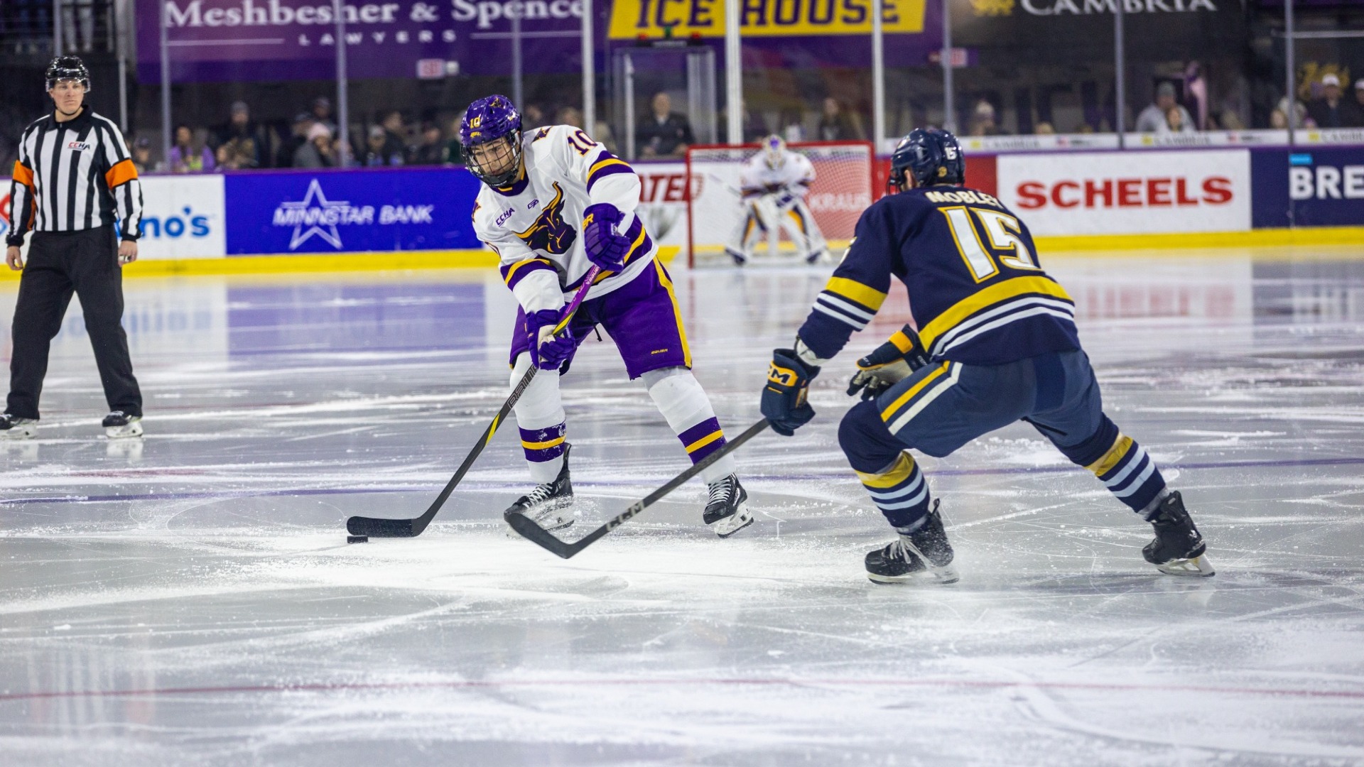 Evan Murr looks to shoot against Augustana 