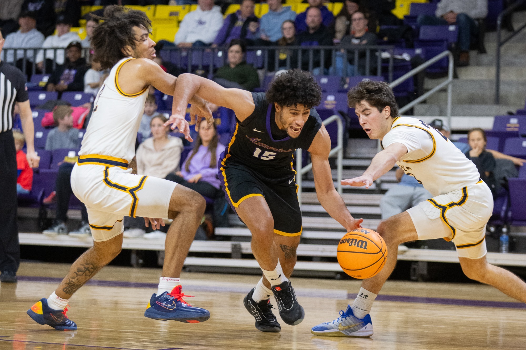 Traijan Sain going for the ball vs. Augustana