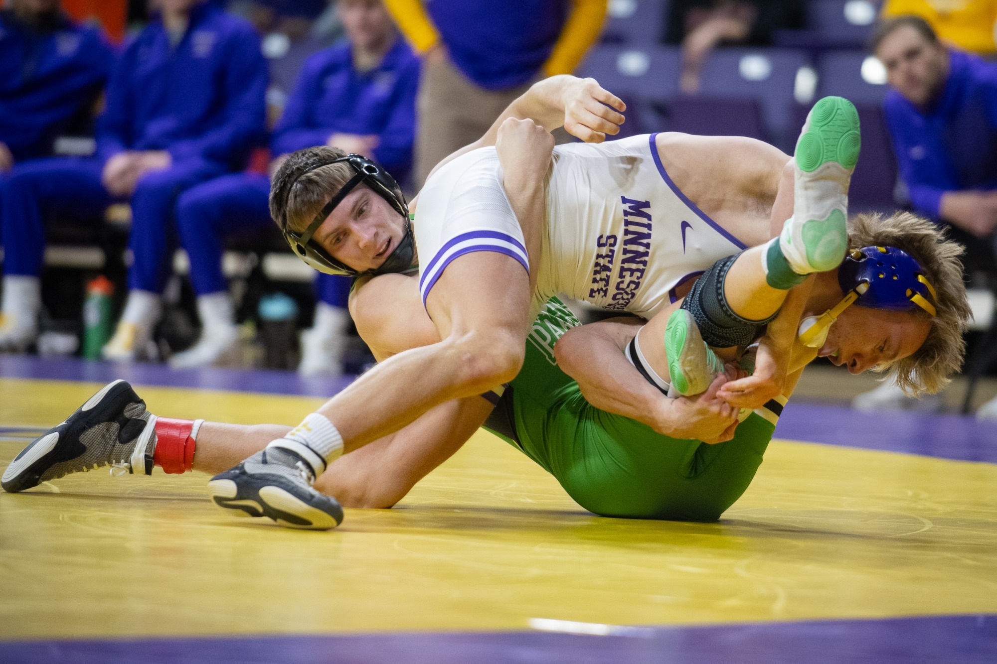Minnesota State's 149-pounder Walker Bents finishes a double-leg takedown in MSU's 22-20 victory over fourth-ranked UW Parkside (12.12).