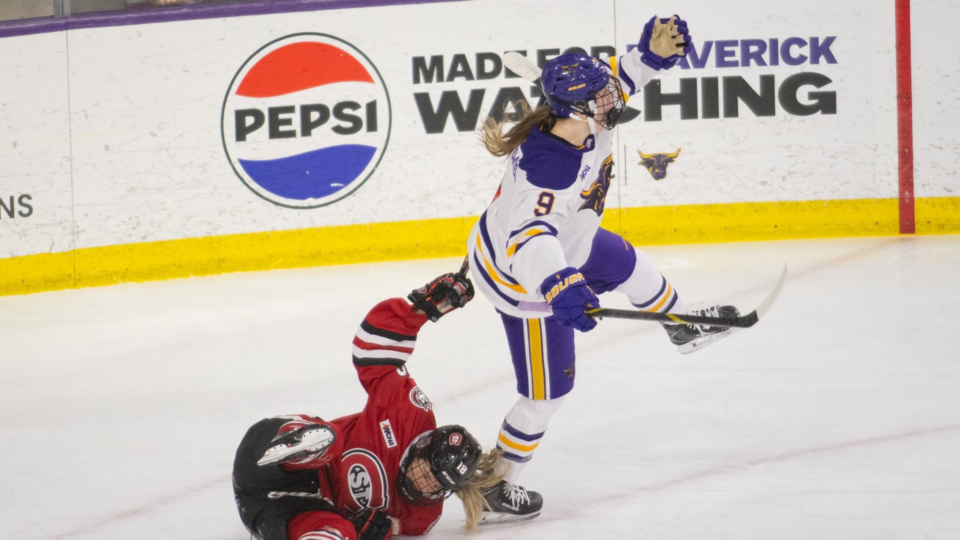 Kamryn Van Batavia celebrating after defeating St. Cloud State 3-2 in overtime 