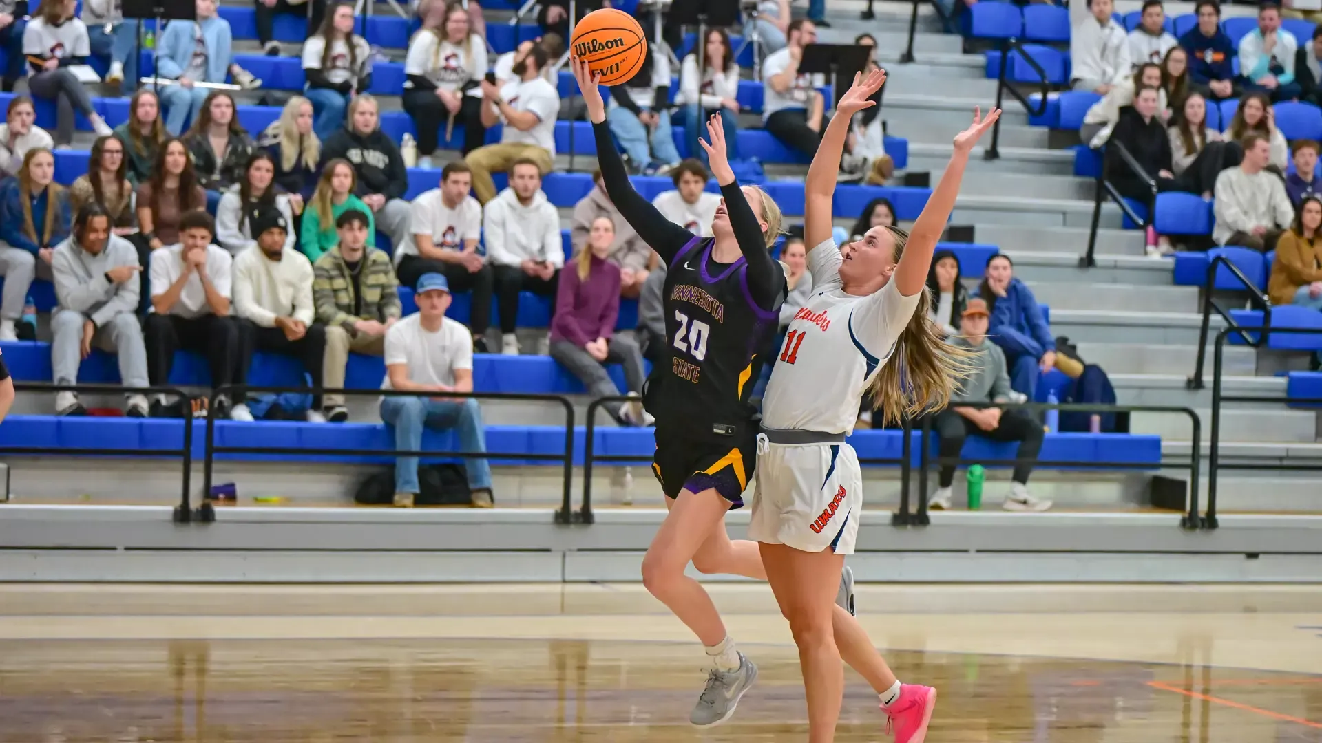 Herzig attempts a layup against UMary