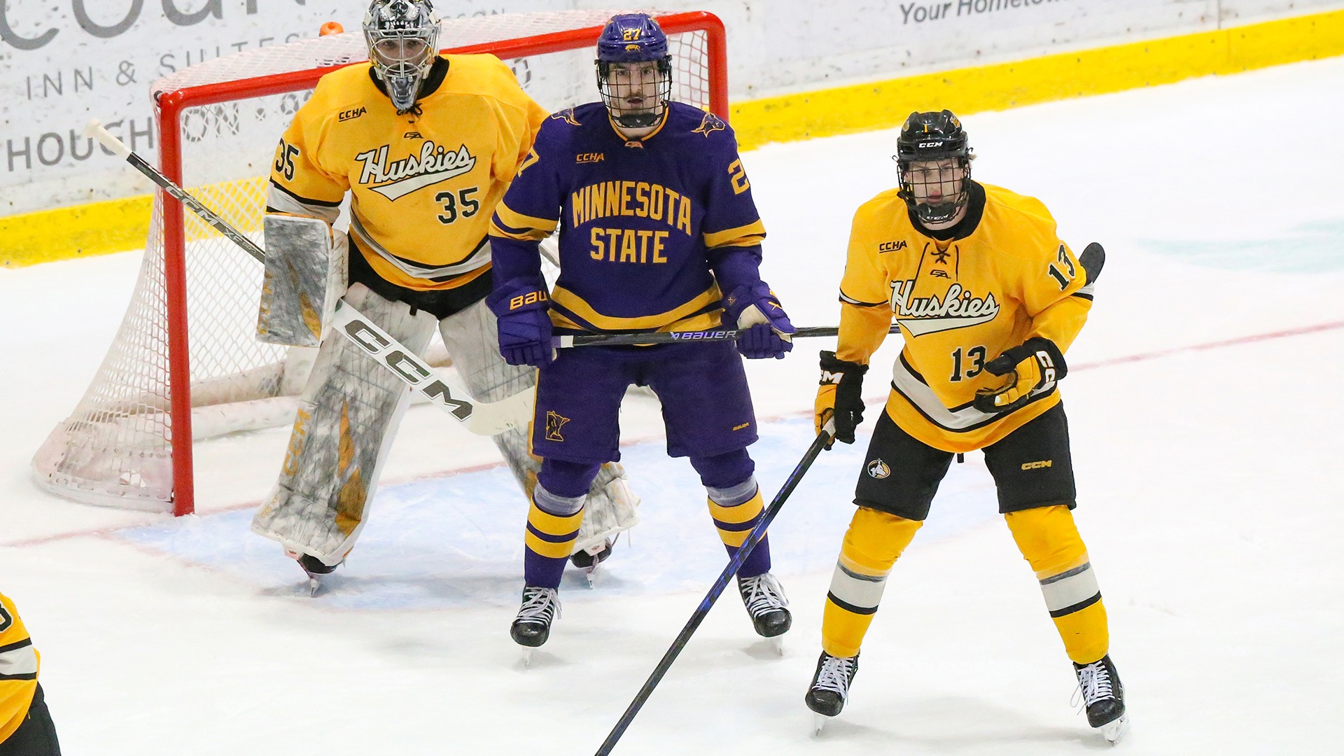 Liam Watkins in front of the Michigan Tech goalie on Saturday