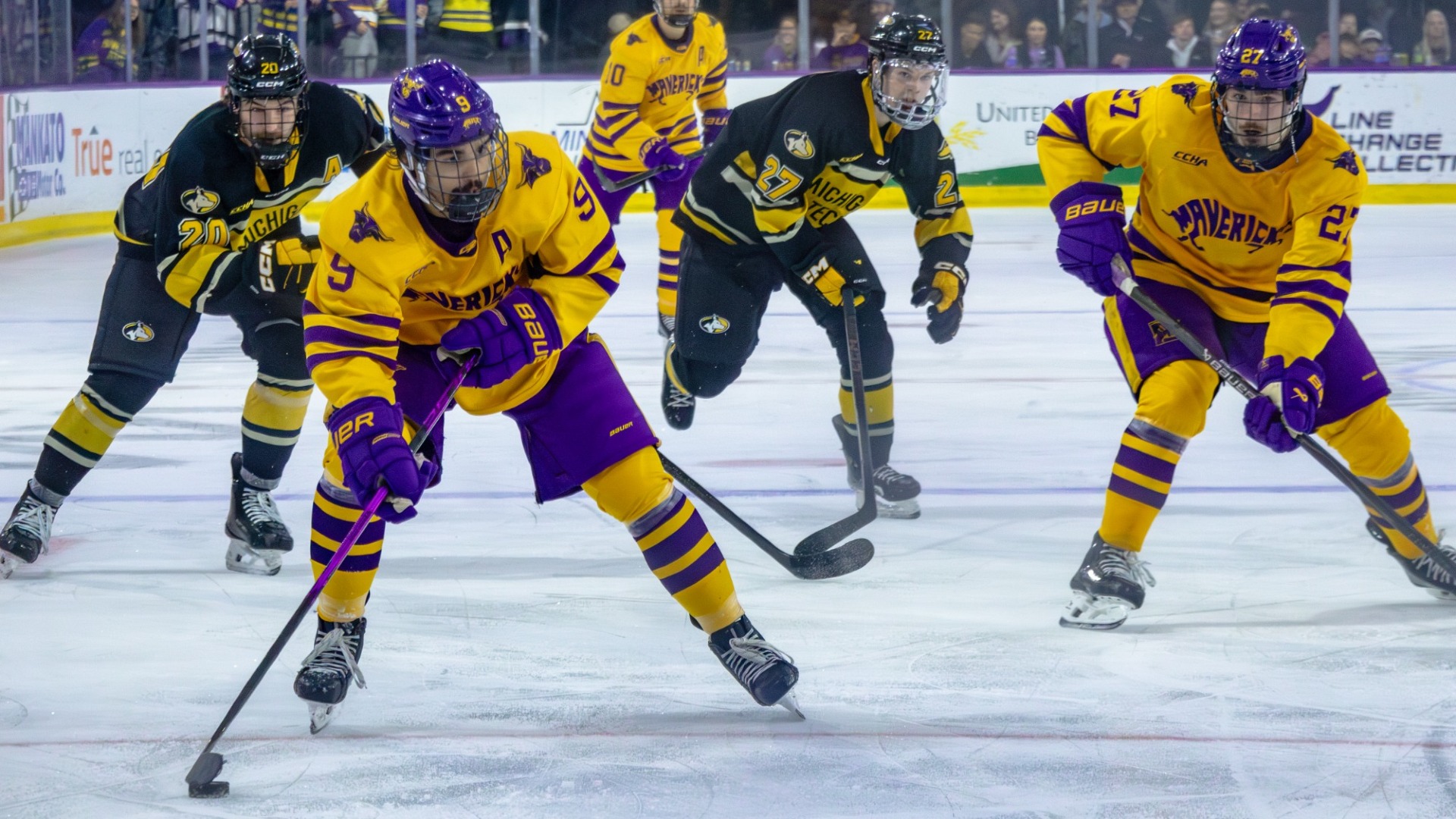 Luigi Benincasa carries across the blueline at home vs. Michigan Tech
