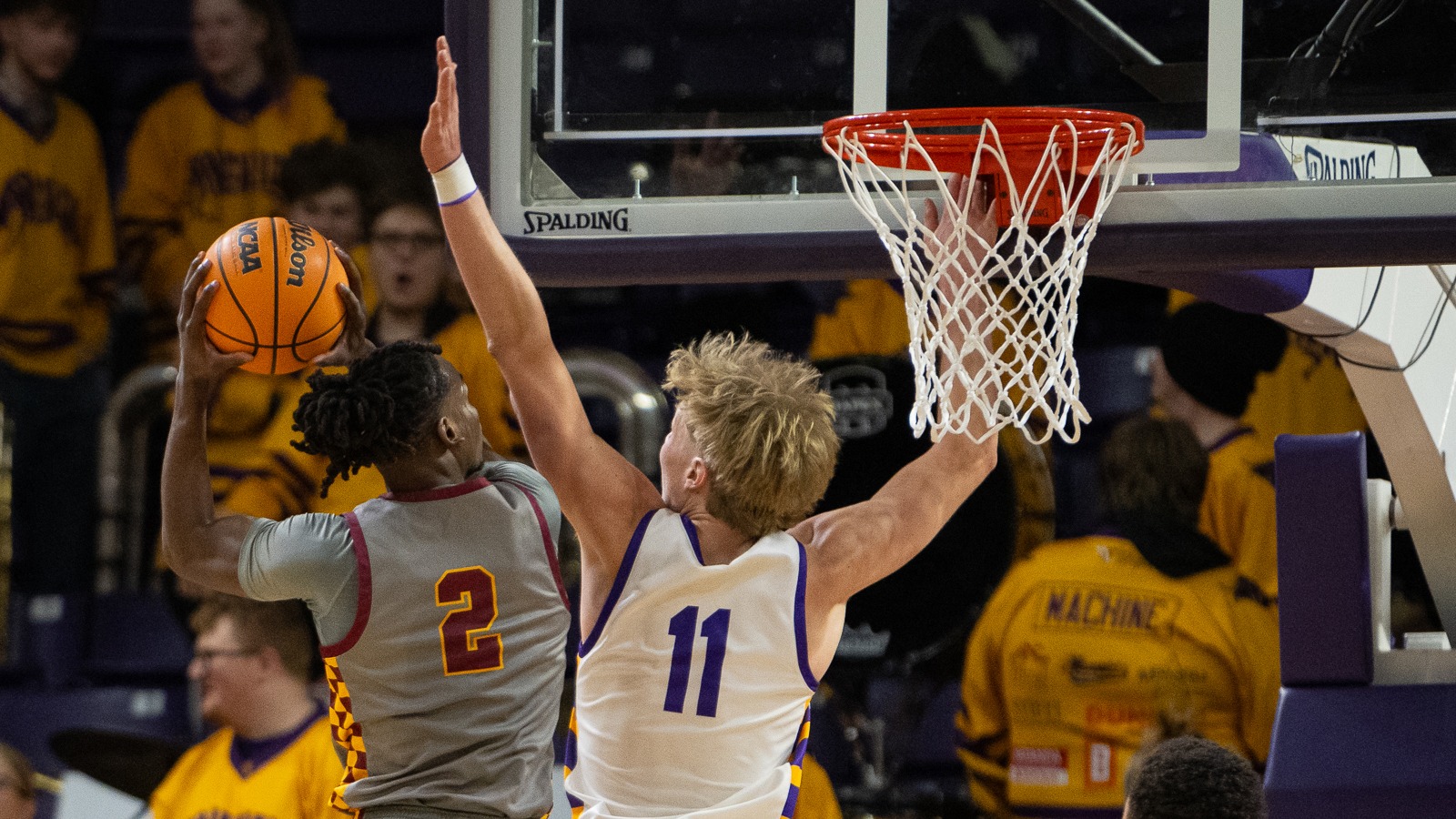 Caden Kirkman defends a shot in MSU's win over Northern State (1.23)