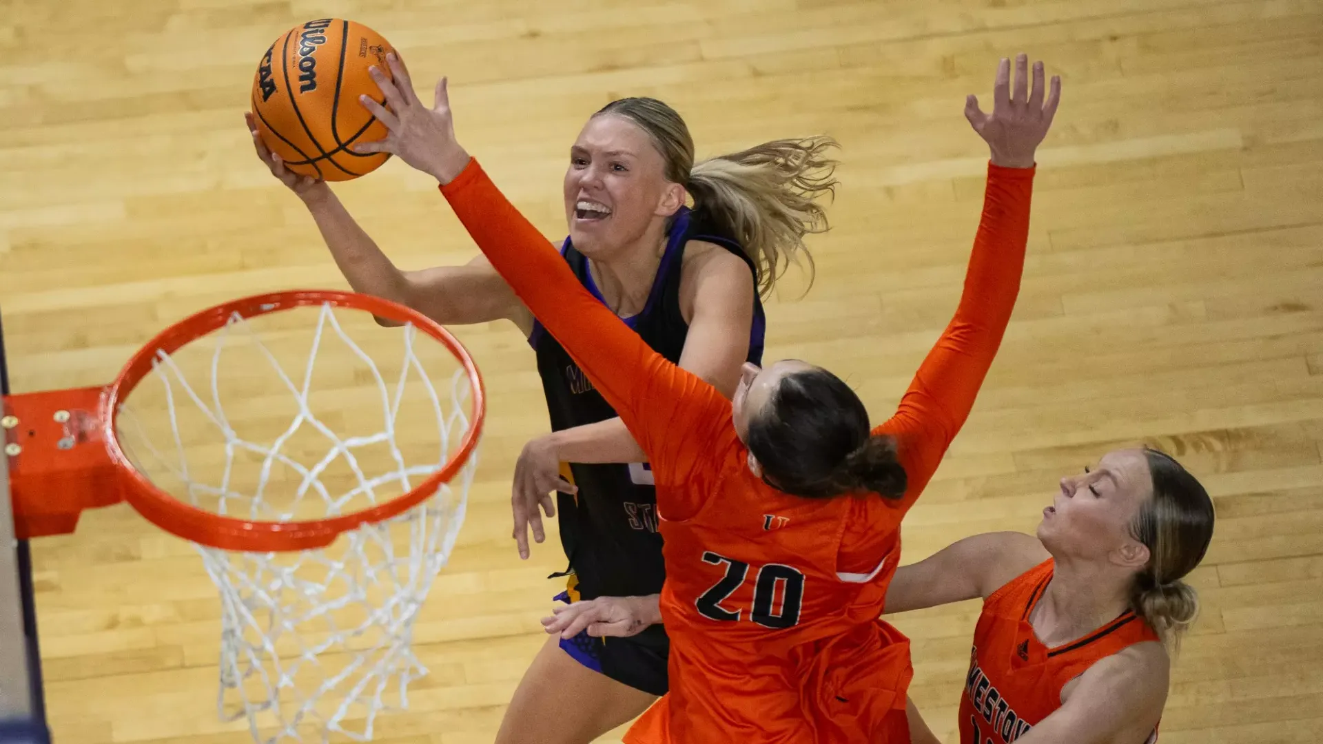 Natalie Bremer goes up for a layup against Jamestown