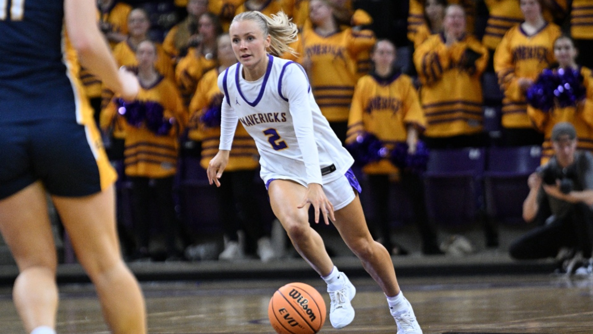 Kent taking the ball up the court