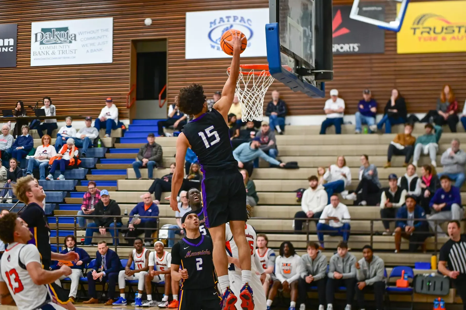 Traijan Sain going up for the dunk vs. UMary