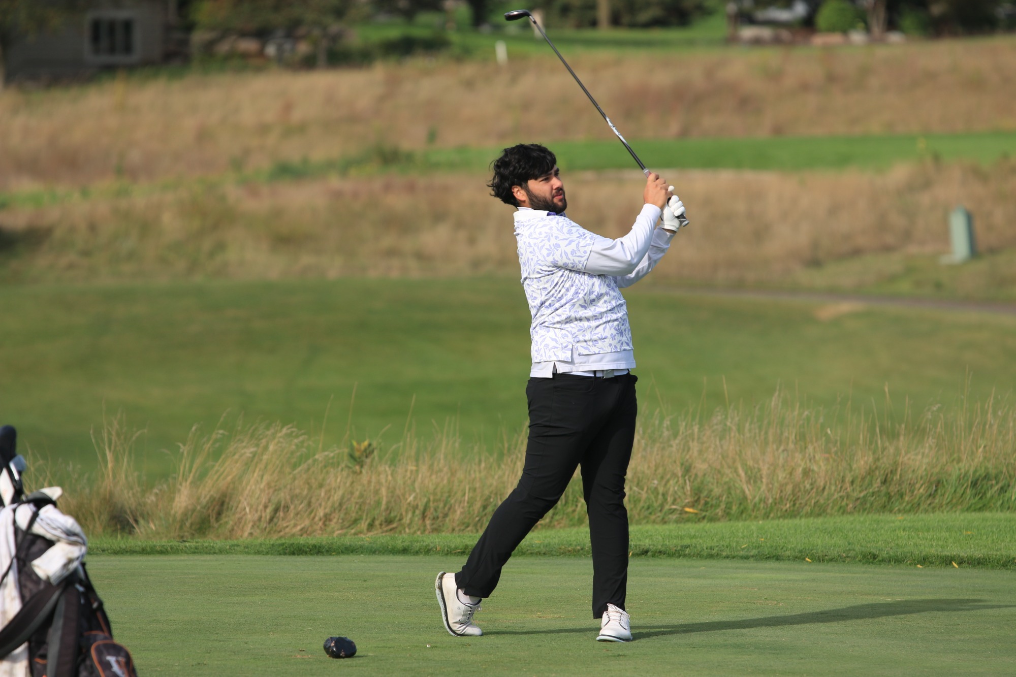 Julian Bhardwaj golfing at the Maverick Fall Brawl