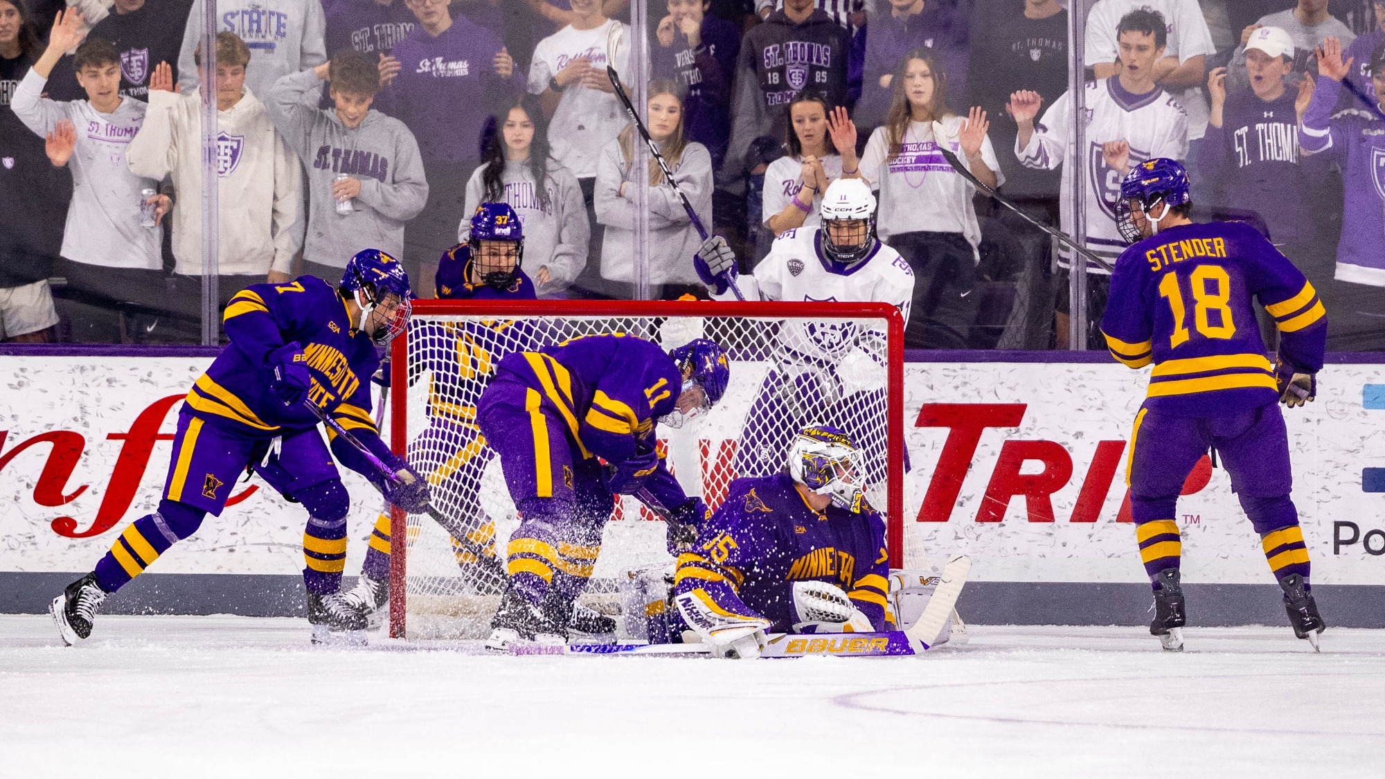 Mavericks play in the defensive zone in front of goaltender Lassi Lehti against ST. Thomas (10/23)