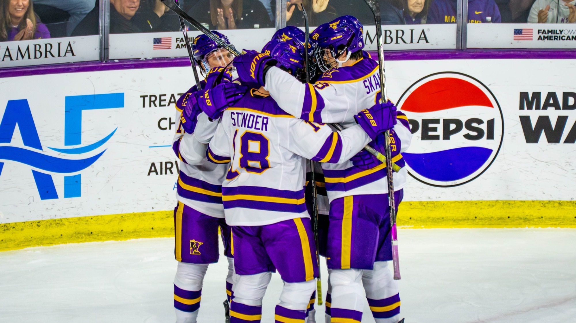 Mavericks celebrate their first goal vs. St. Thomas