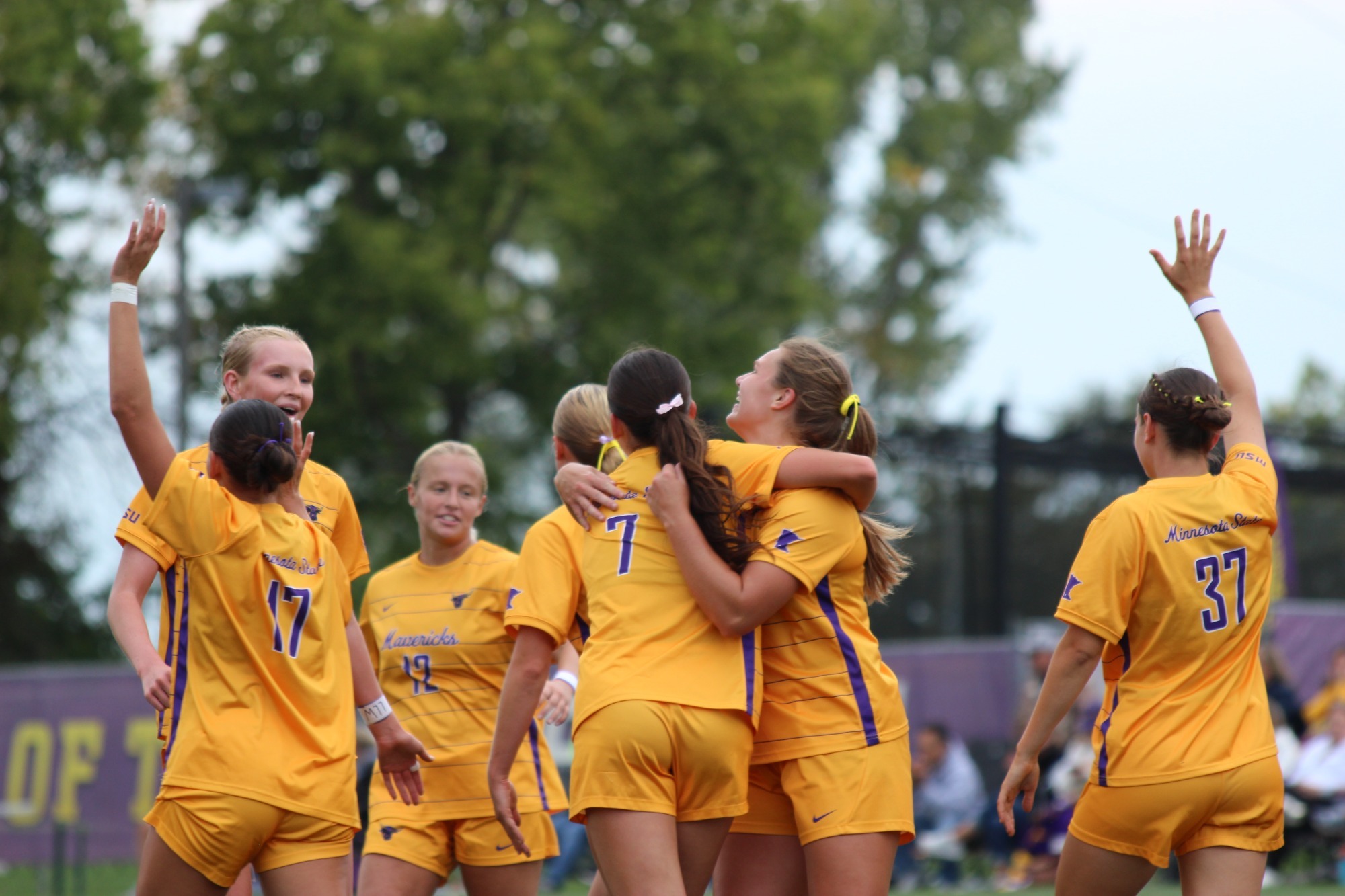 Mavericks celebrate a goal as a team