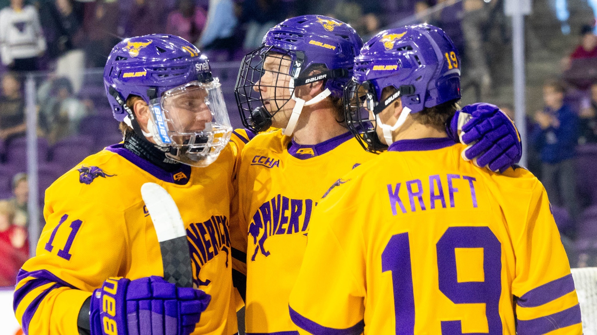 Men's Hockey Players after a Maverick Goal