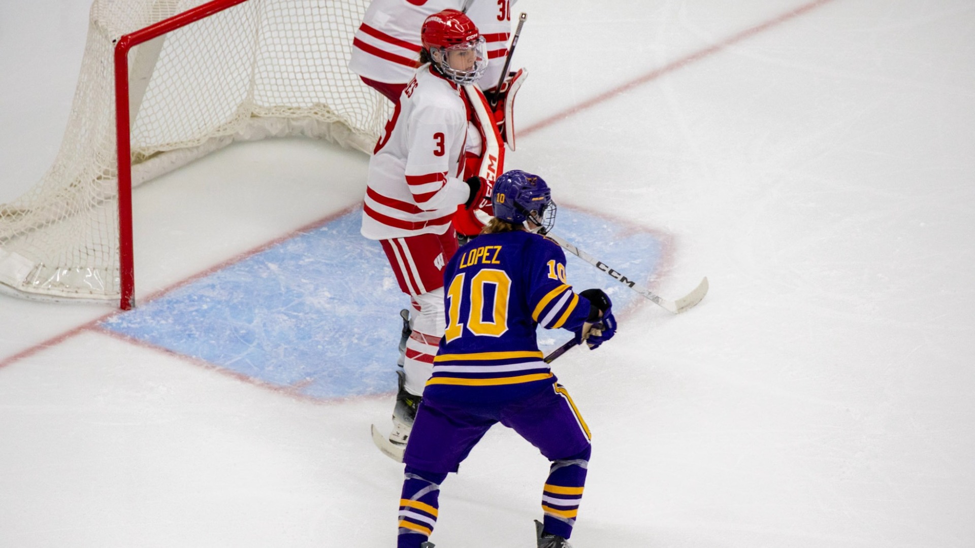 Zoe Lopez ready for the puck up at the net 