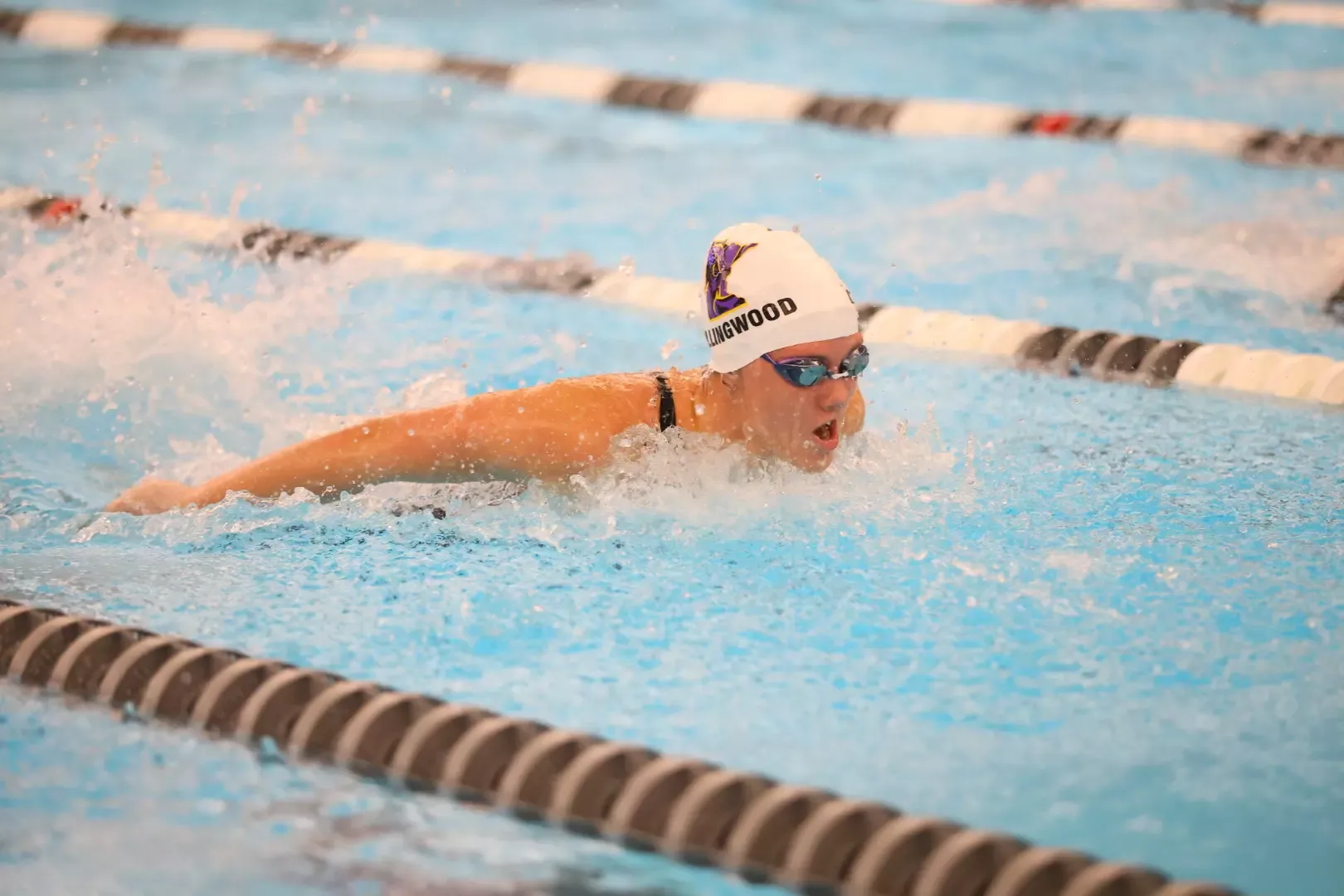 Teresa Collingwood swimming in the 200 IM event at the NSIC Championships
