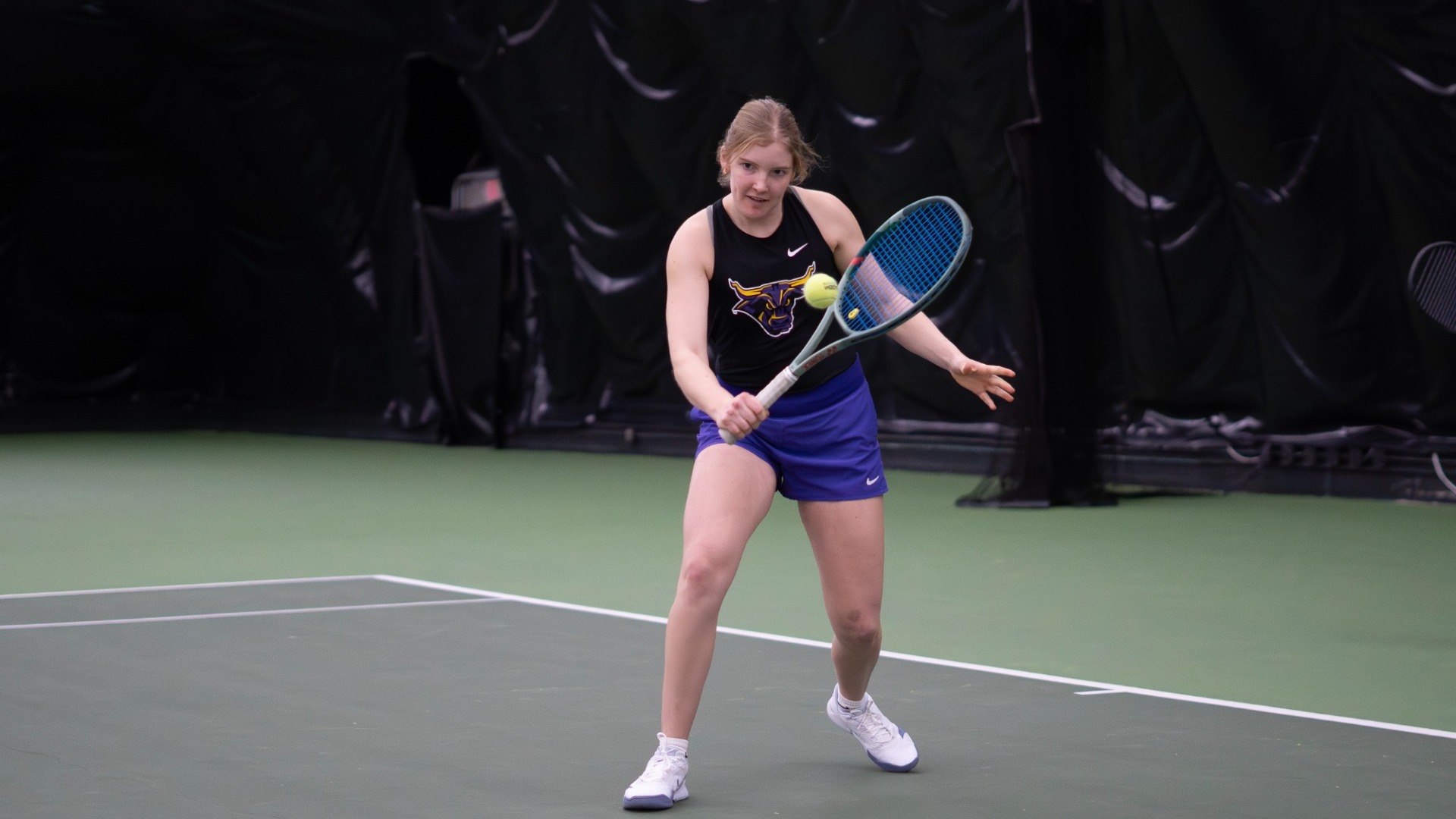 Julia Gurholt backhand at gustavus tennis center spring 2026