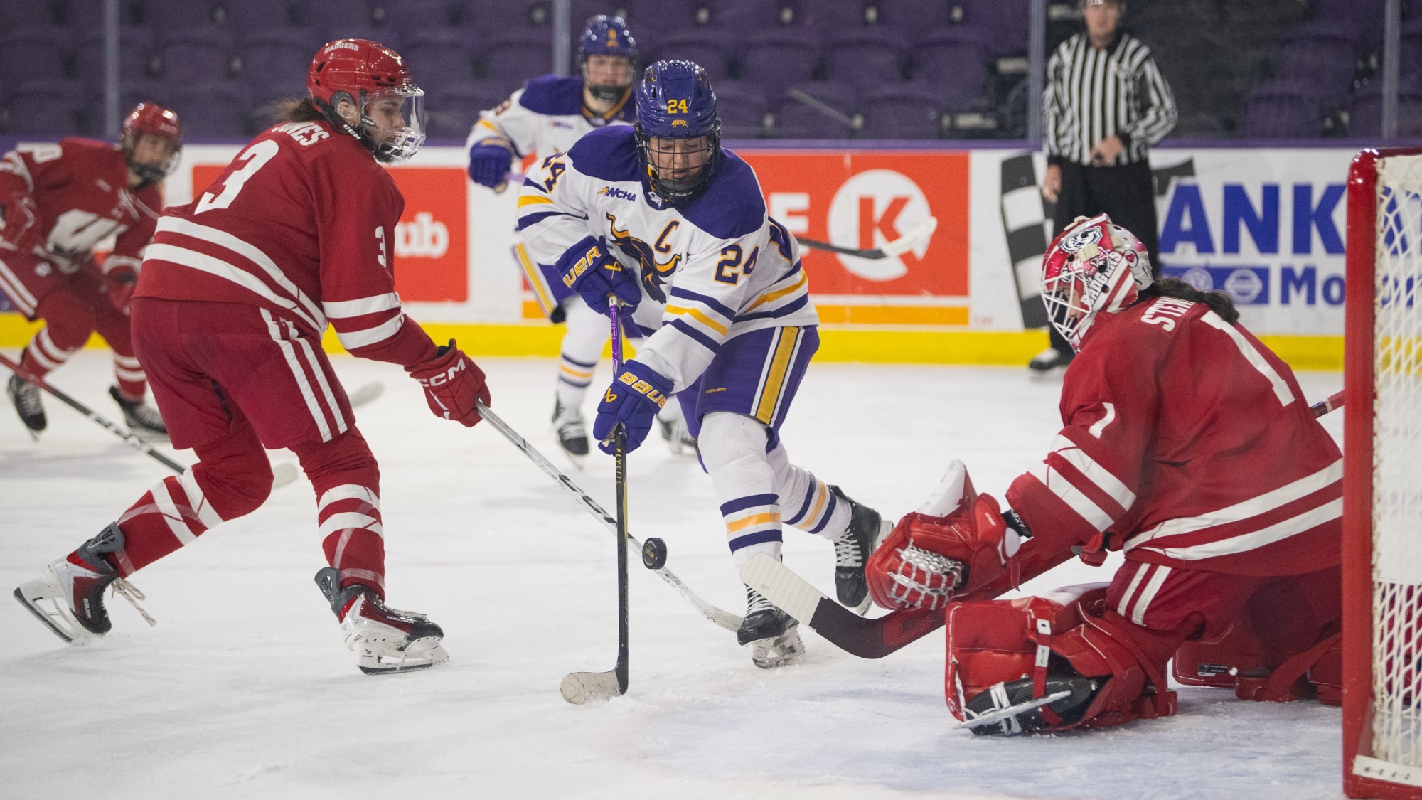 Taylor Otremba battles in front of the net during MSU's game against Wisconsin (2.13)