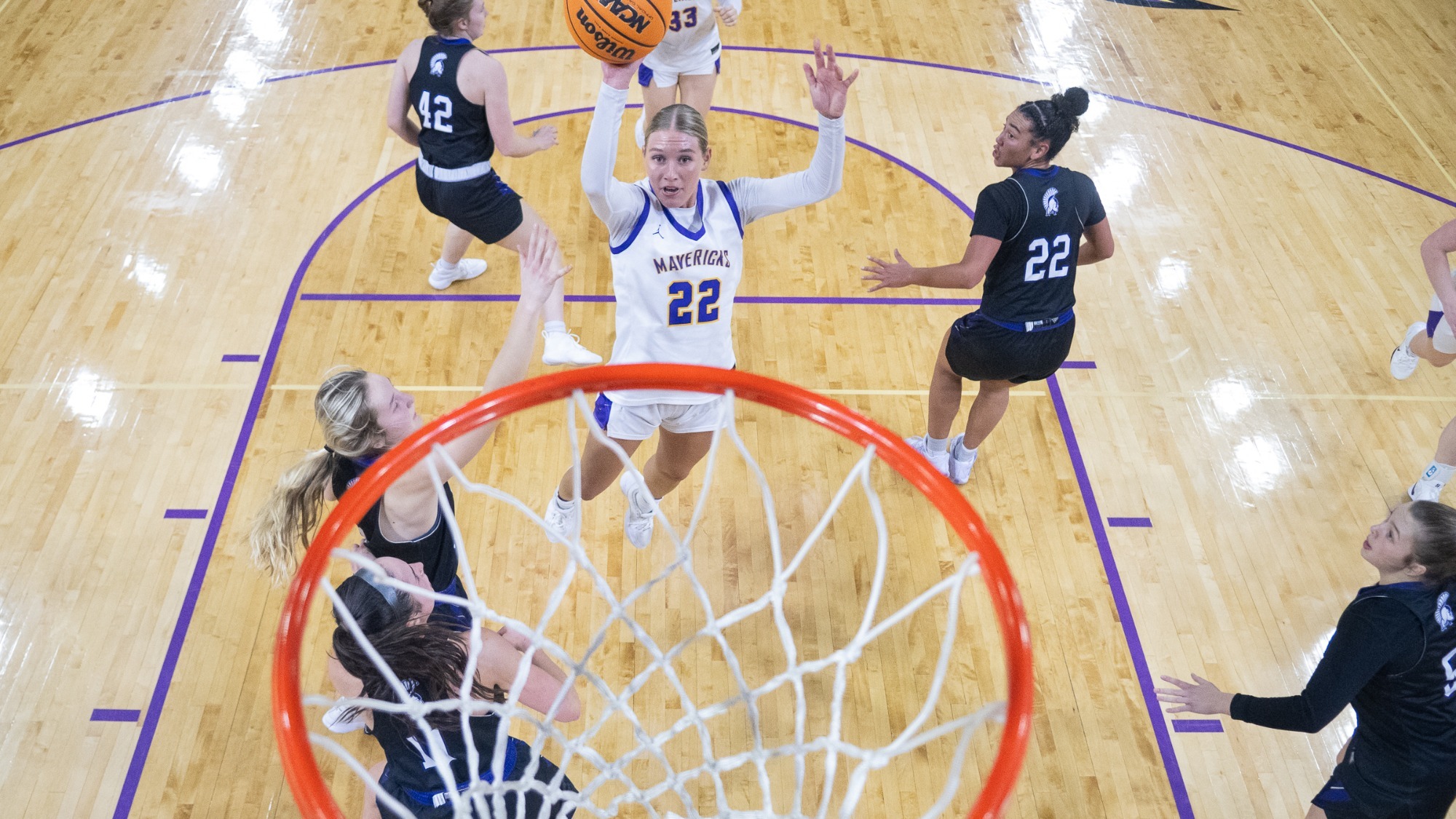 Mackenzie Schweim shoots a floater in the paint during MSU's win over Winona State (2/19)
