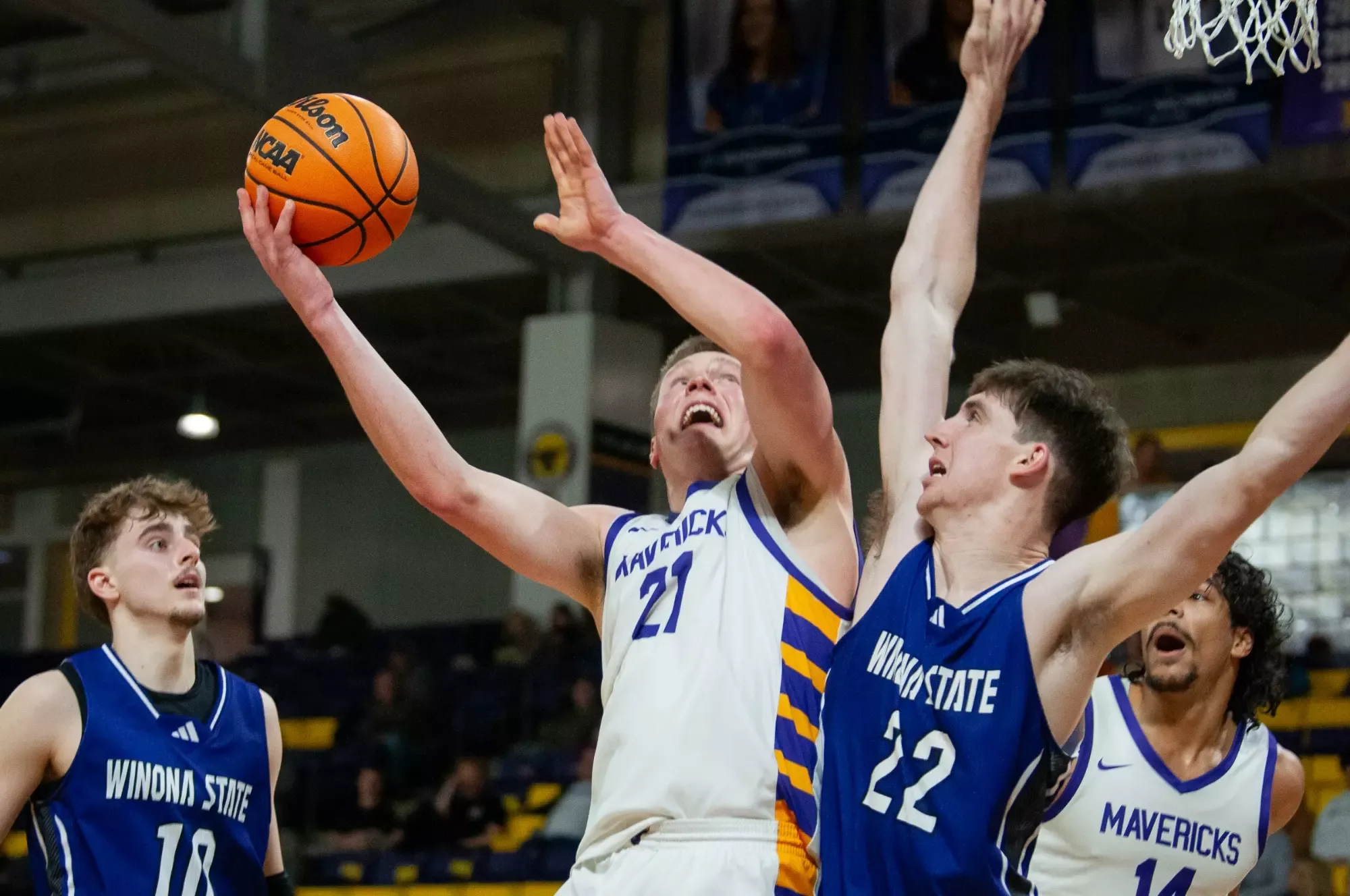 Colton Benson with the ball against Winona State