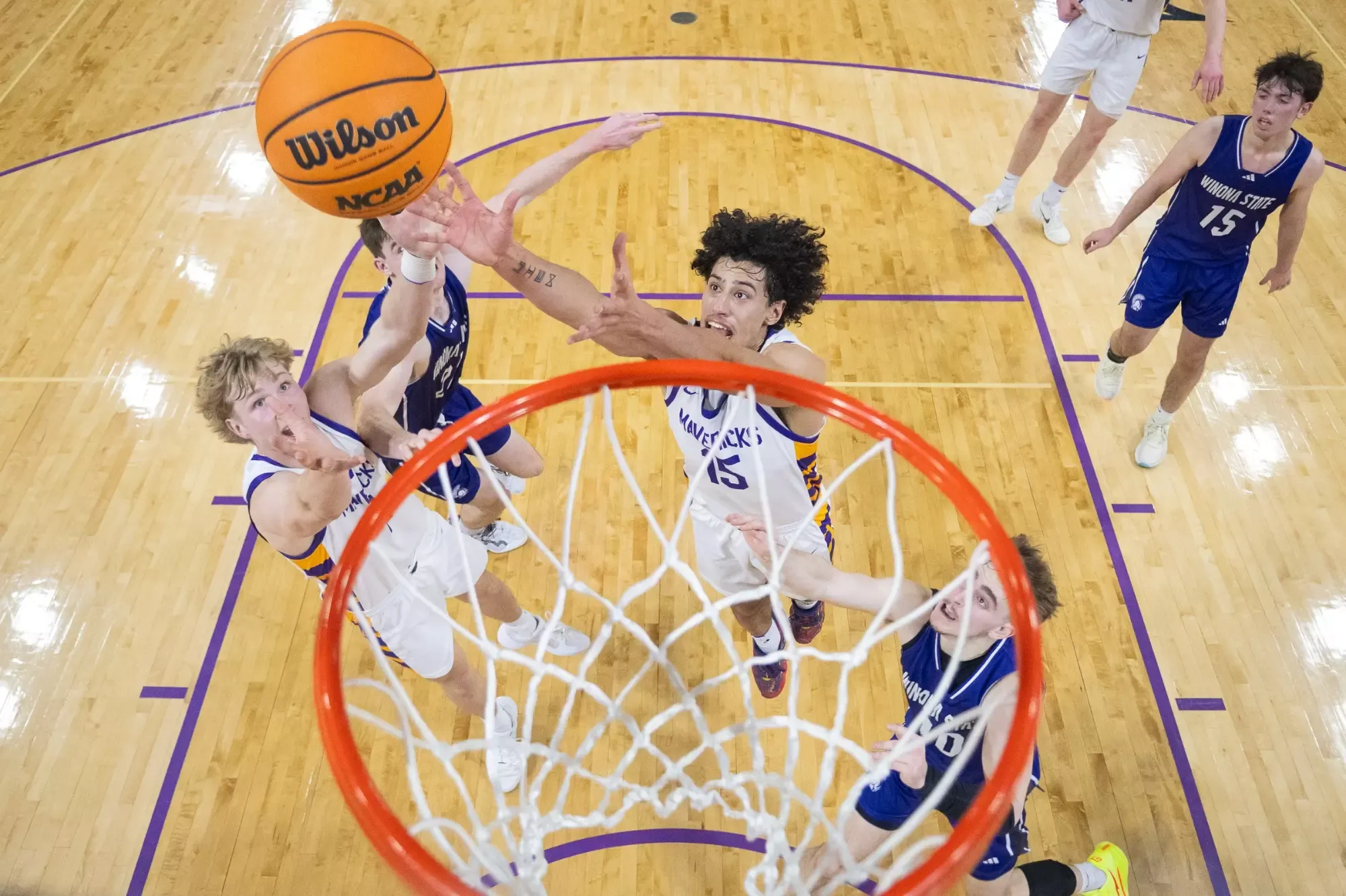 Traijan Sain going for the rebound against Winona State
