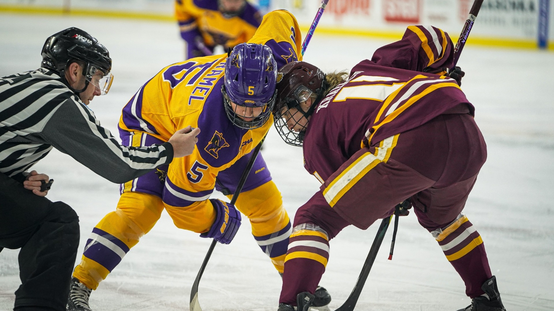 Sophie Stramel vs Minnesota Duluth in faceoff circle 