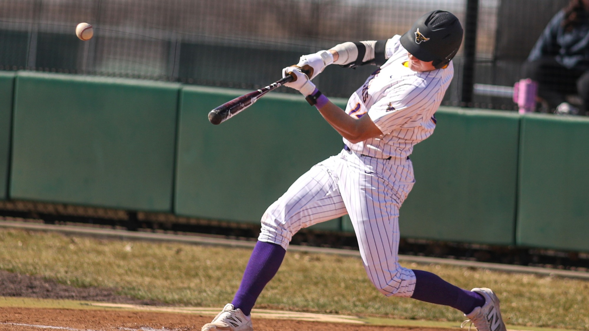 Louis Magers connects on a pitch during MSU's game against UMary (2.27)