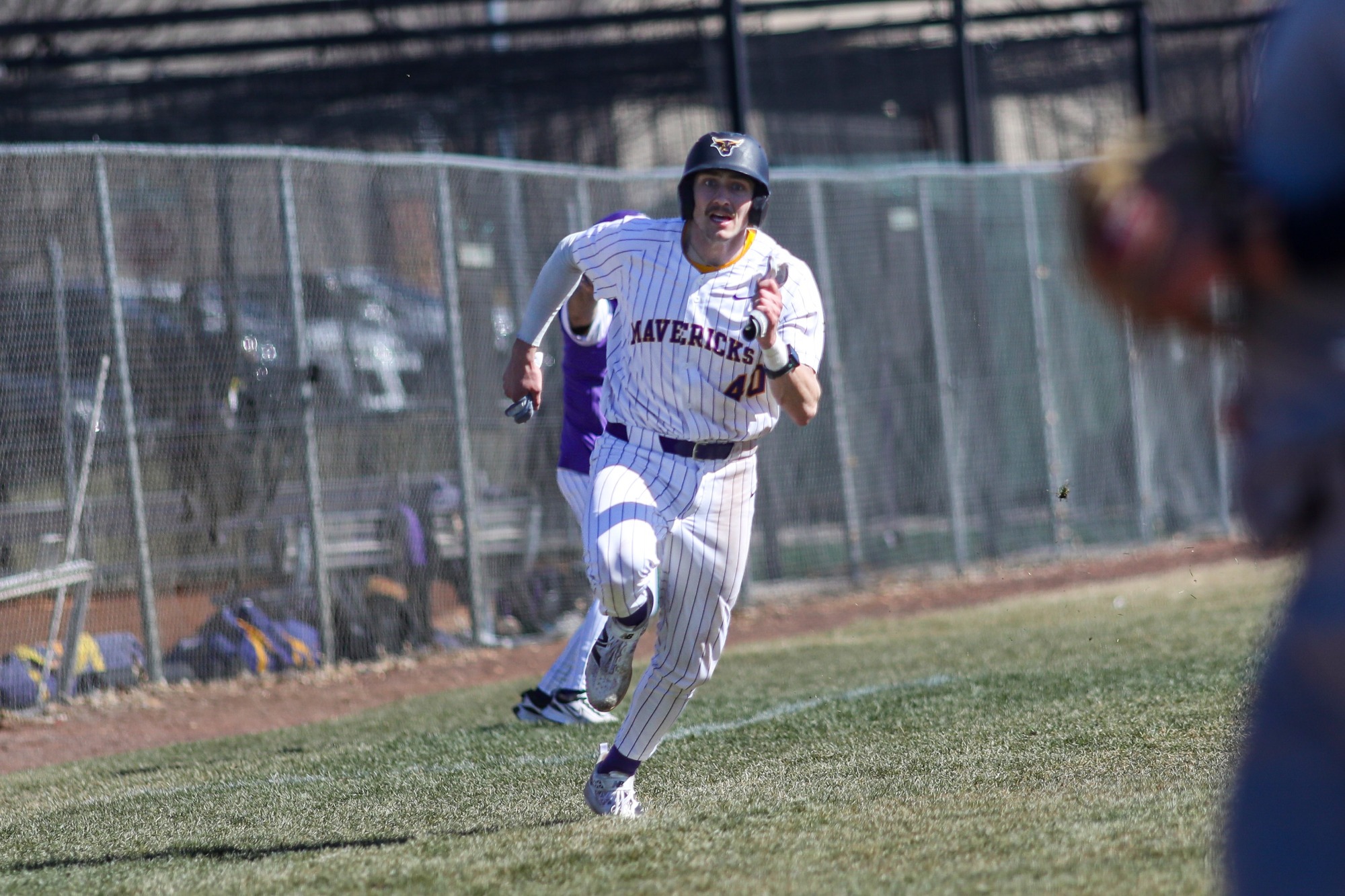 Brandon Vlcko rounds third and scores during MSU's game against U-Mary (2.27)