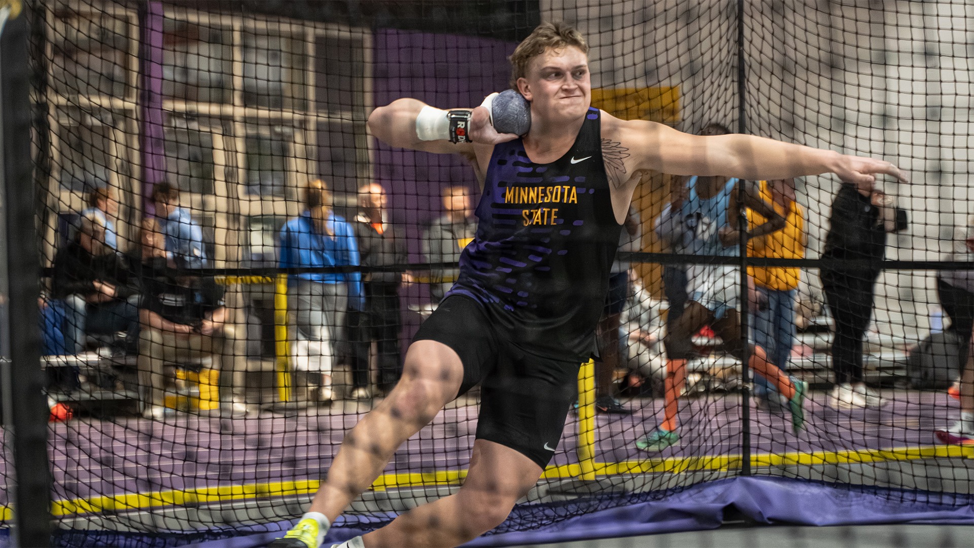 Hayden Bills Action shot put at mark shuck open and multi