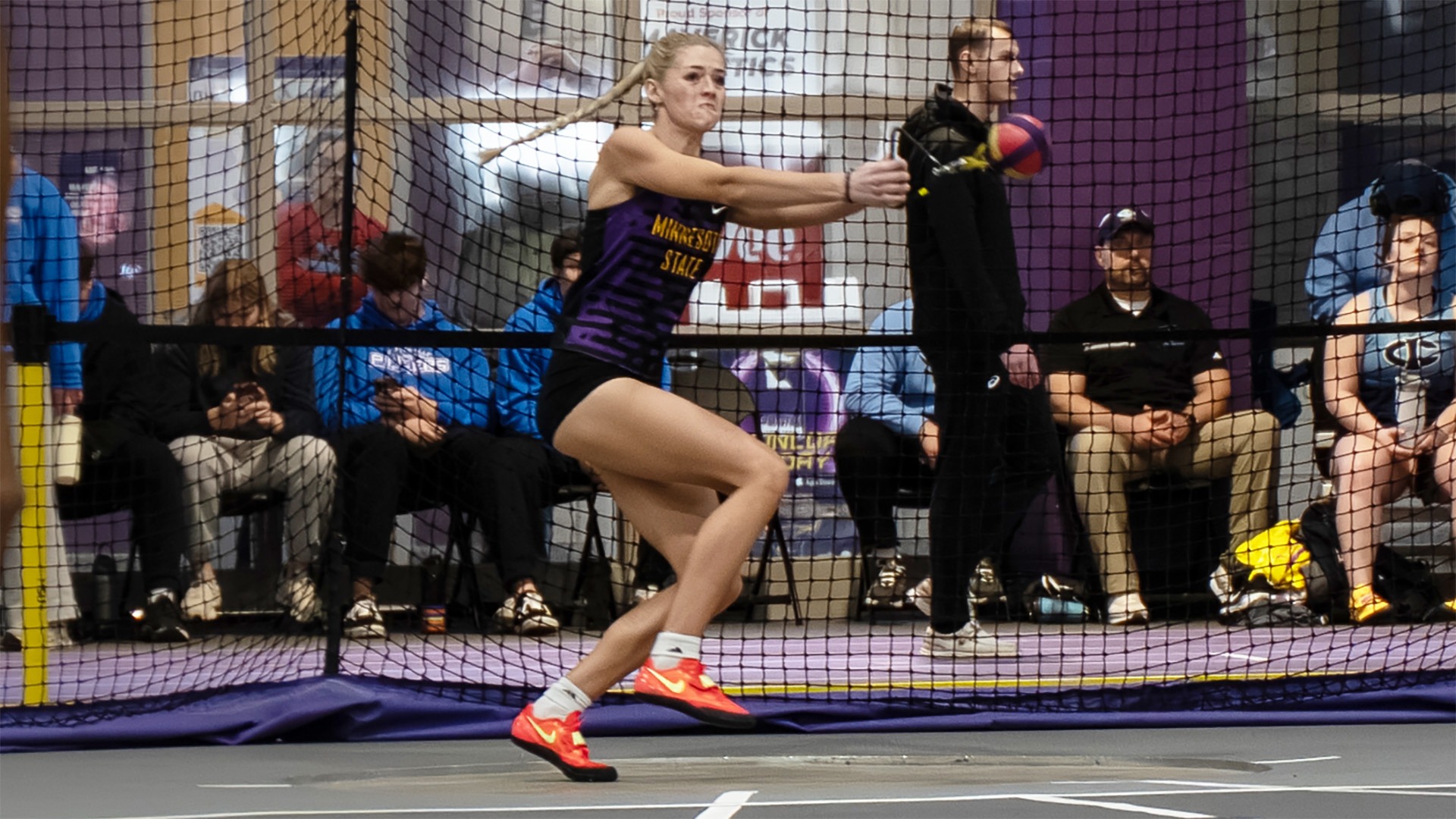 Elise Jensen weight throw at mark schuck open and multi
