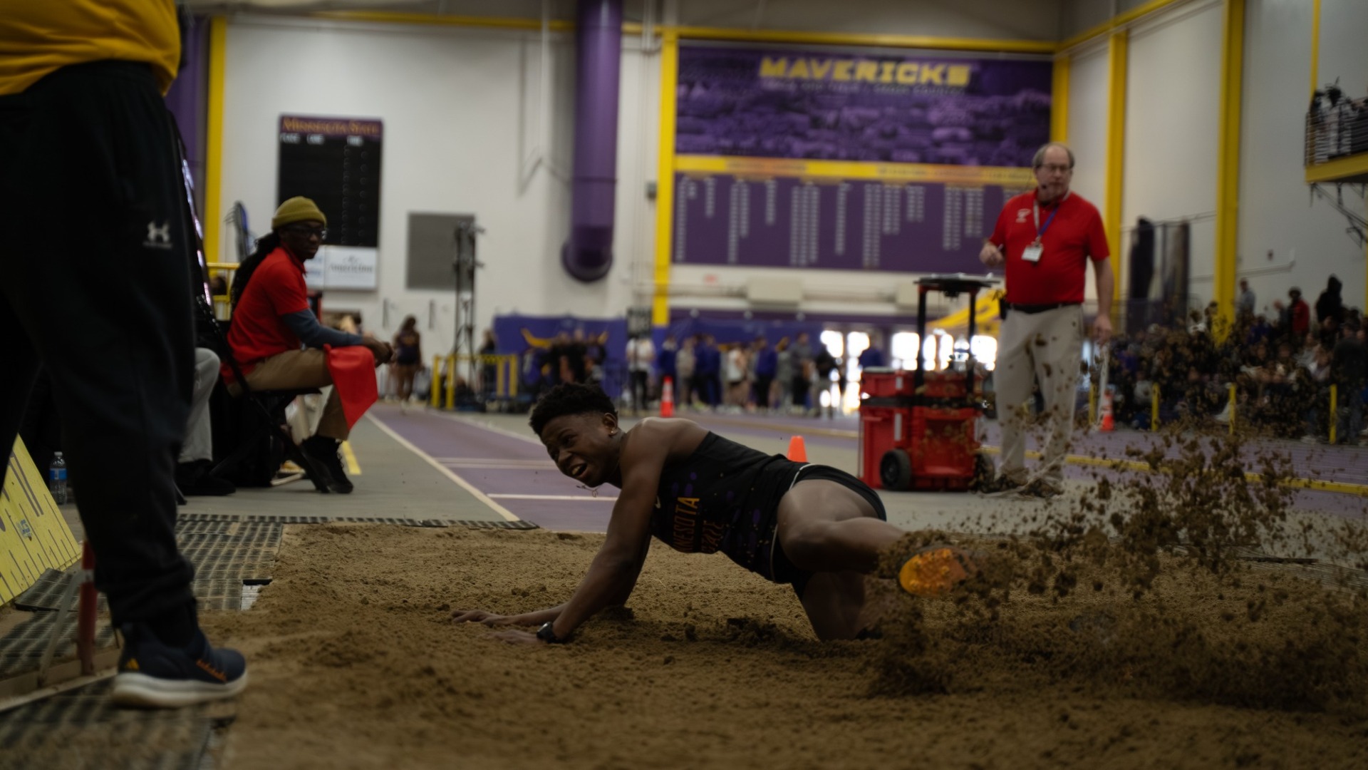 Dorcus Opoku lands in the sand at mark schuck open and multi
