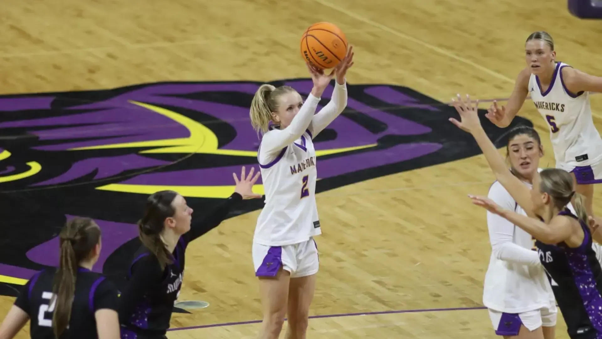 Adeline Kent goes up for a jumper against USF