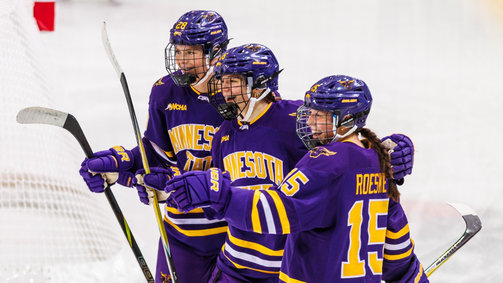 Ava Guillemette, Ayla Puppe and Kianna Roeske all celebrate after Puppe's goal vs St. Cloud State 