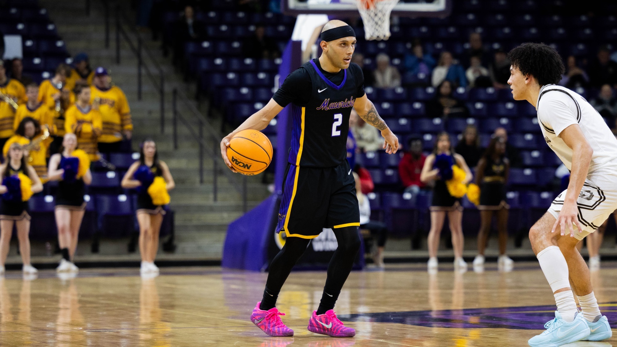 Arhman Lewis brings the ball up the court during MSU's game against SMSU (2.7)