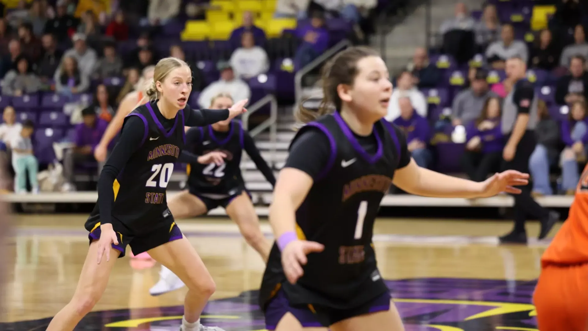 Hannah Herzig and Hannah Leverson apply defensive pressure against Jamestown