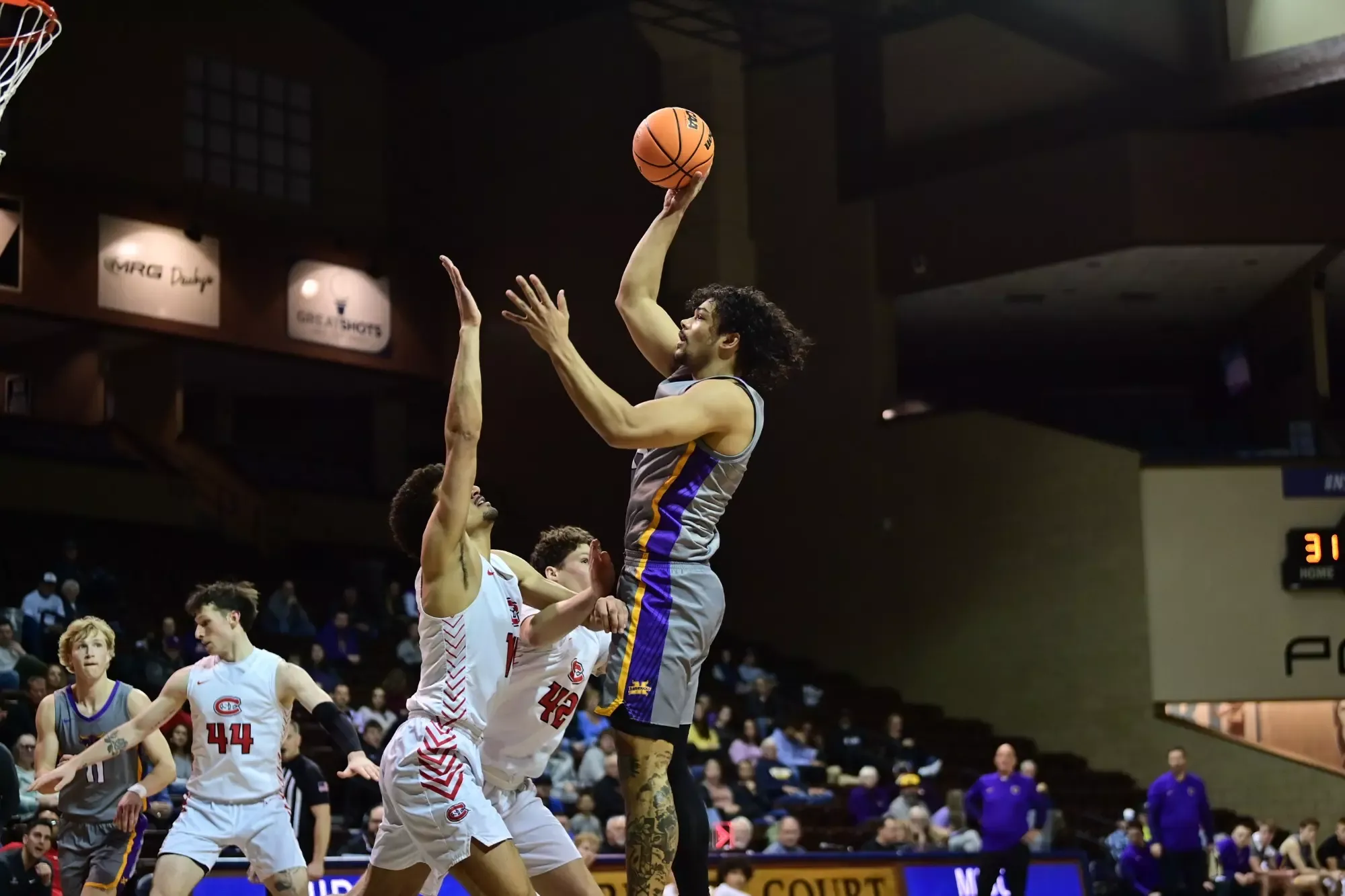 Malcolm Jones taking a jump shot vs. St. Cloud State