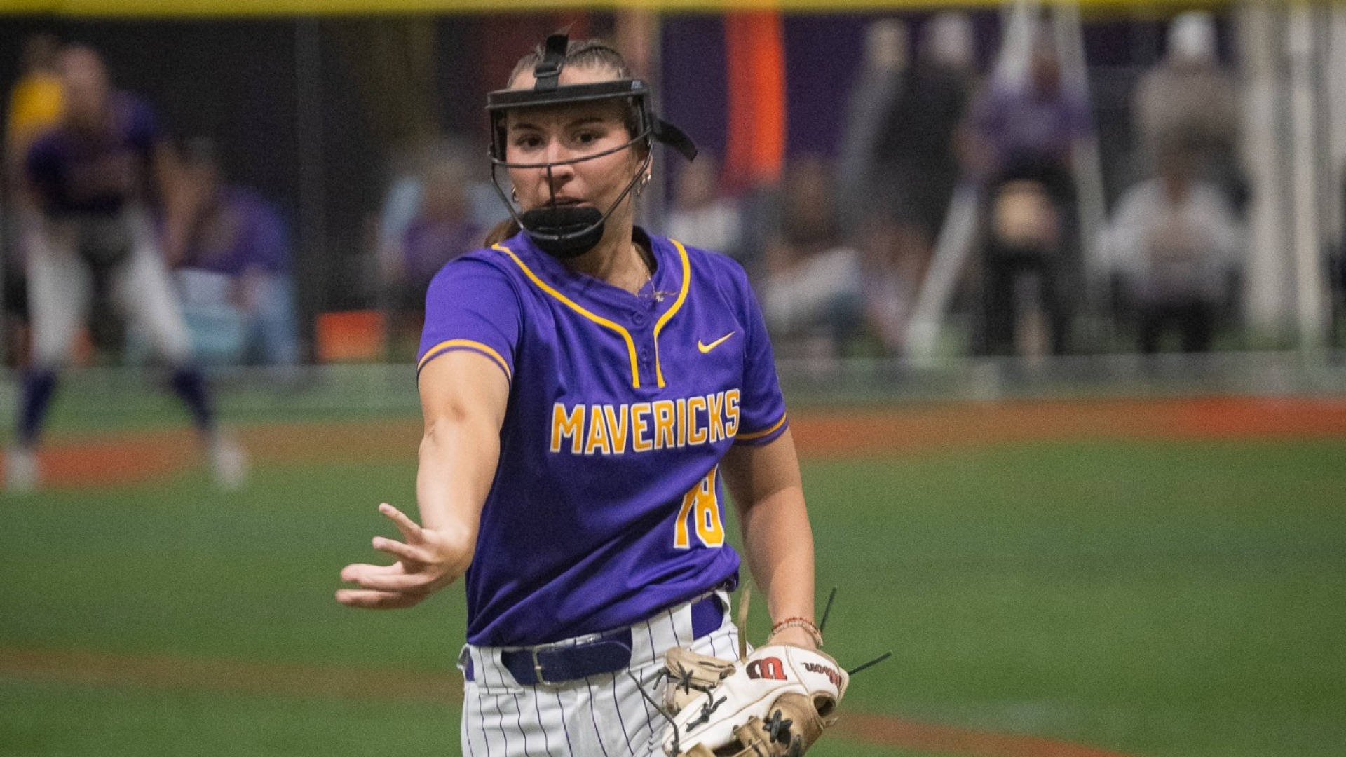 Lucy Porter pitches the ball against NSU